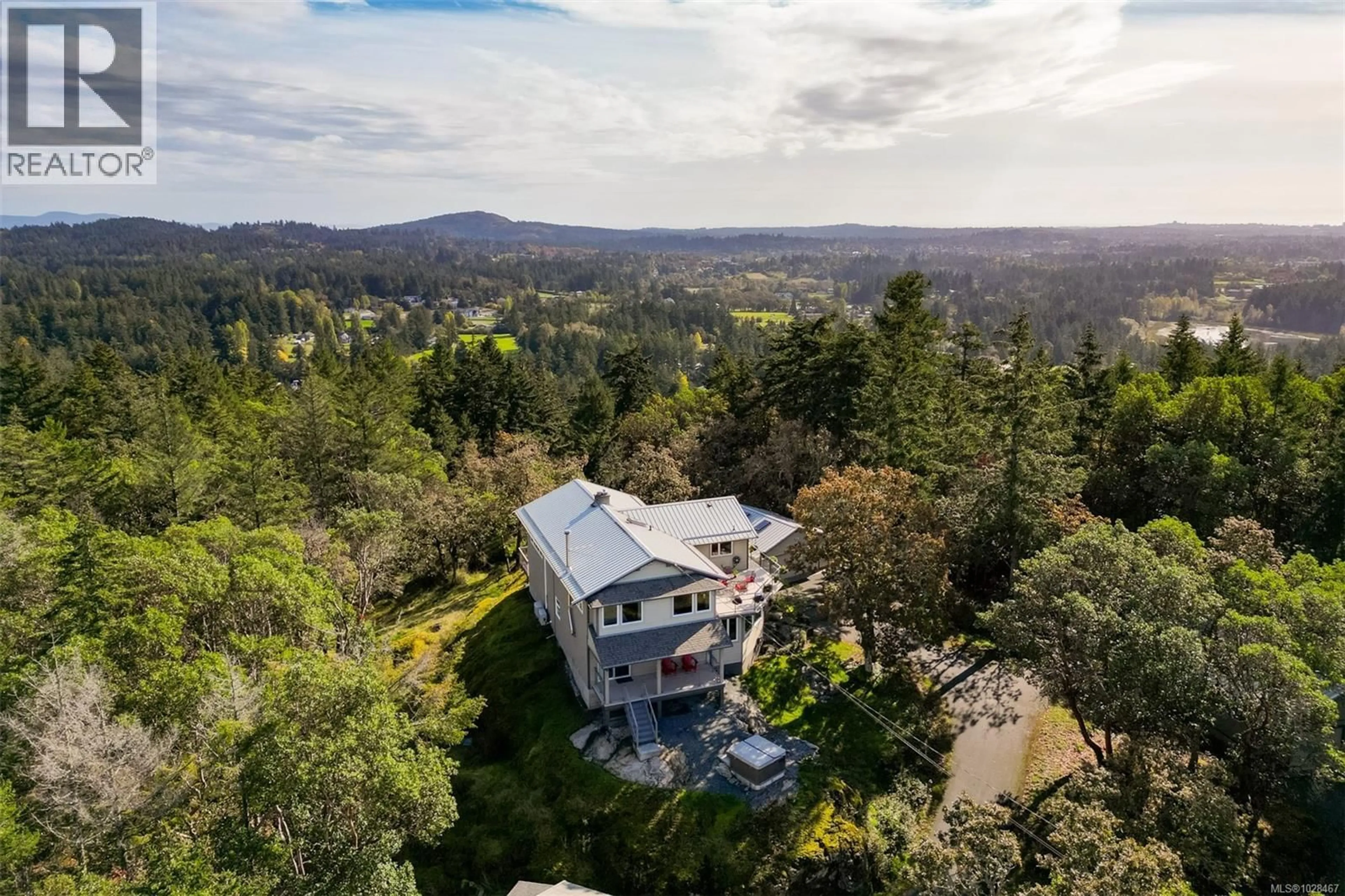 A pic from outside/outdoor area/front of a property/back of a property/a pic from drone, forest/trees view for 4801 EXCELSIOR ROAD, Saanich British Columbia V9E2E5