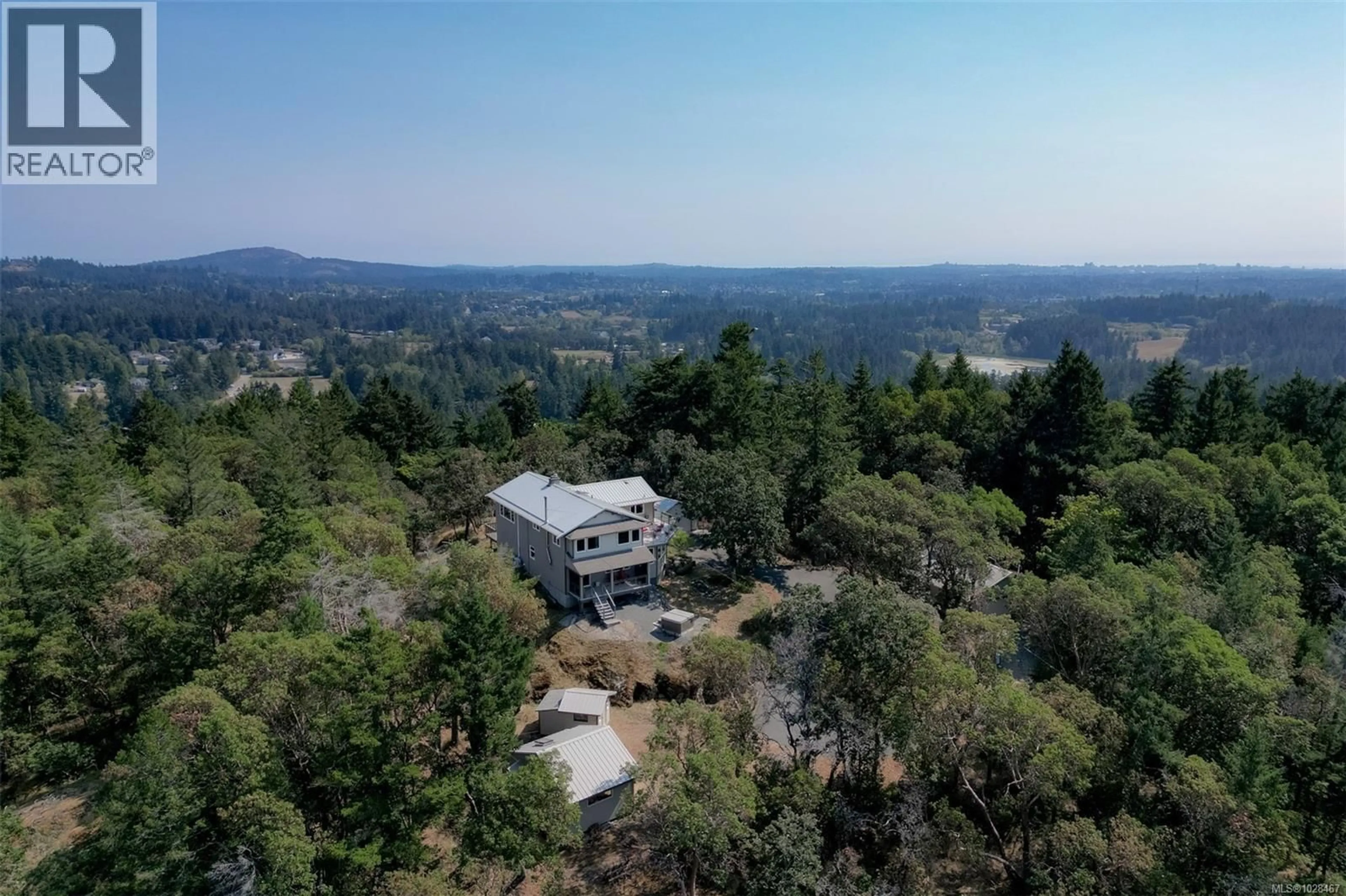 A pic from outside/outdoor area/front of a property/back of a property/a pic from drone, mountain view for 4801 EXCELSIOR ROAD, Saanich British Columbia V9E2E5
