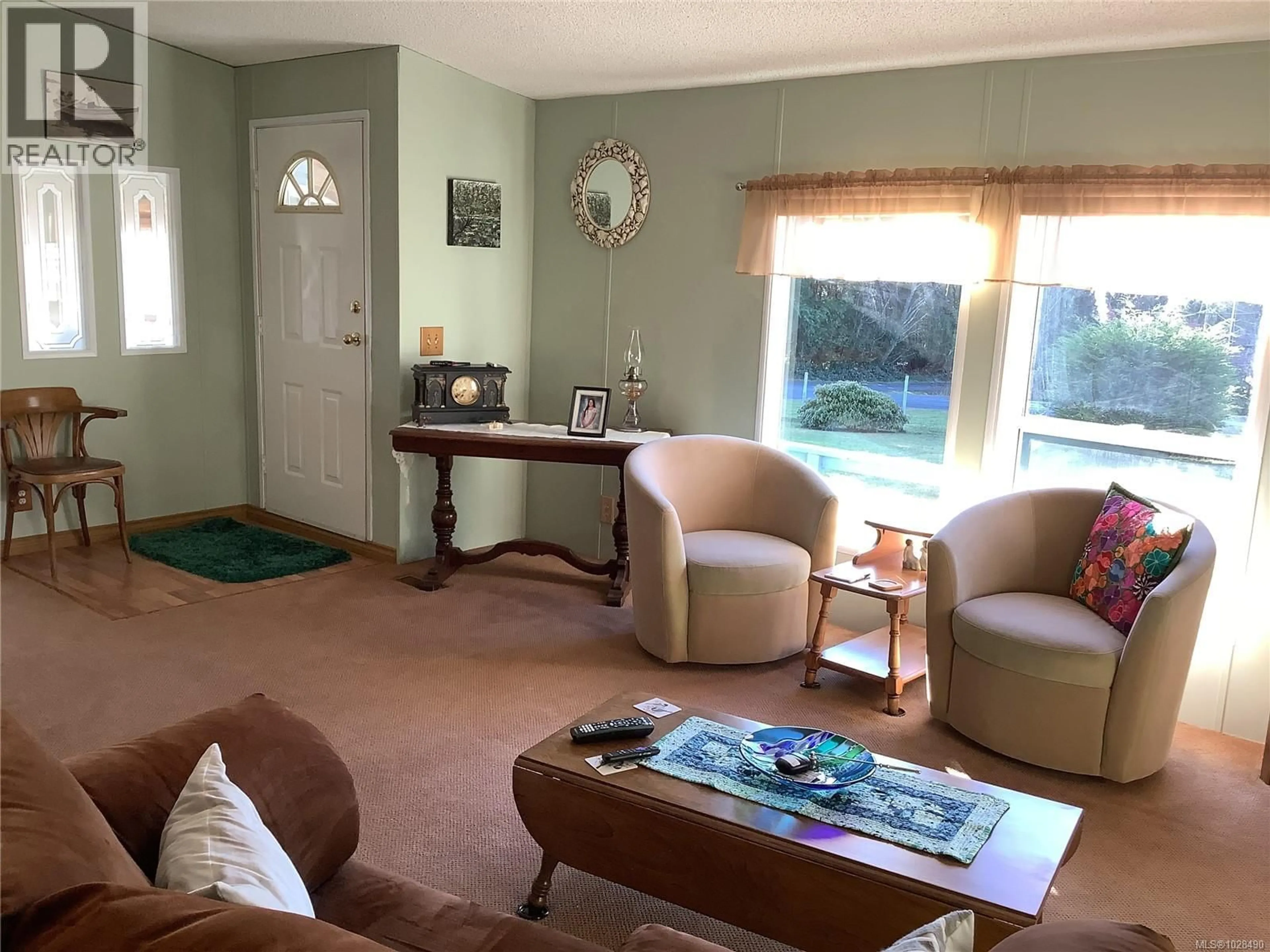 Living room with furniture, unknown for 245 3RD STREET, Sointula British Columbia V0N3E0