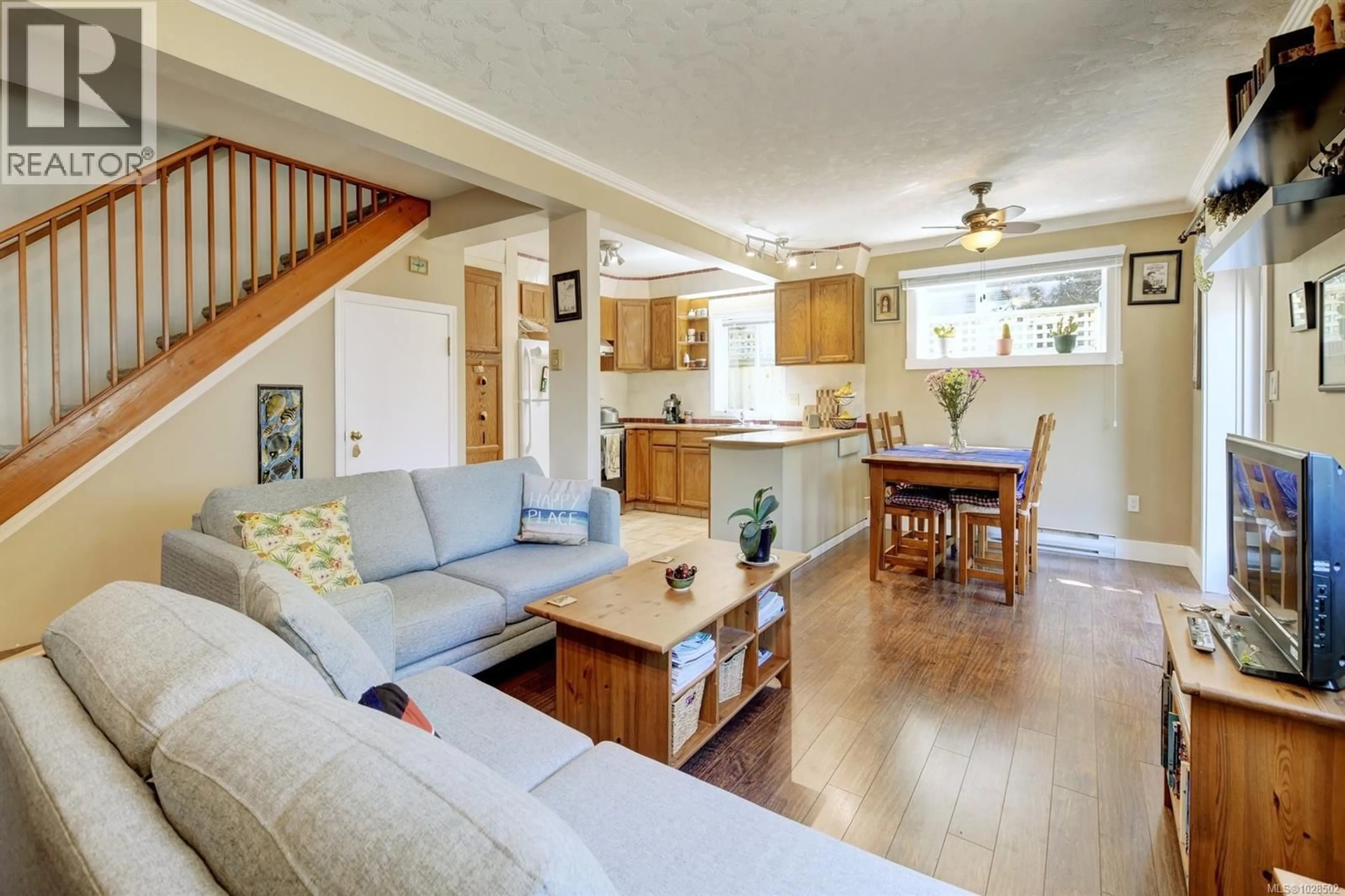 Open concept kitchen, wood/laminate floor for 2112 SAYWARD STREET, Victoria British Columbia V8R3T3