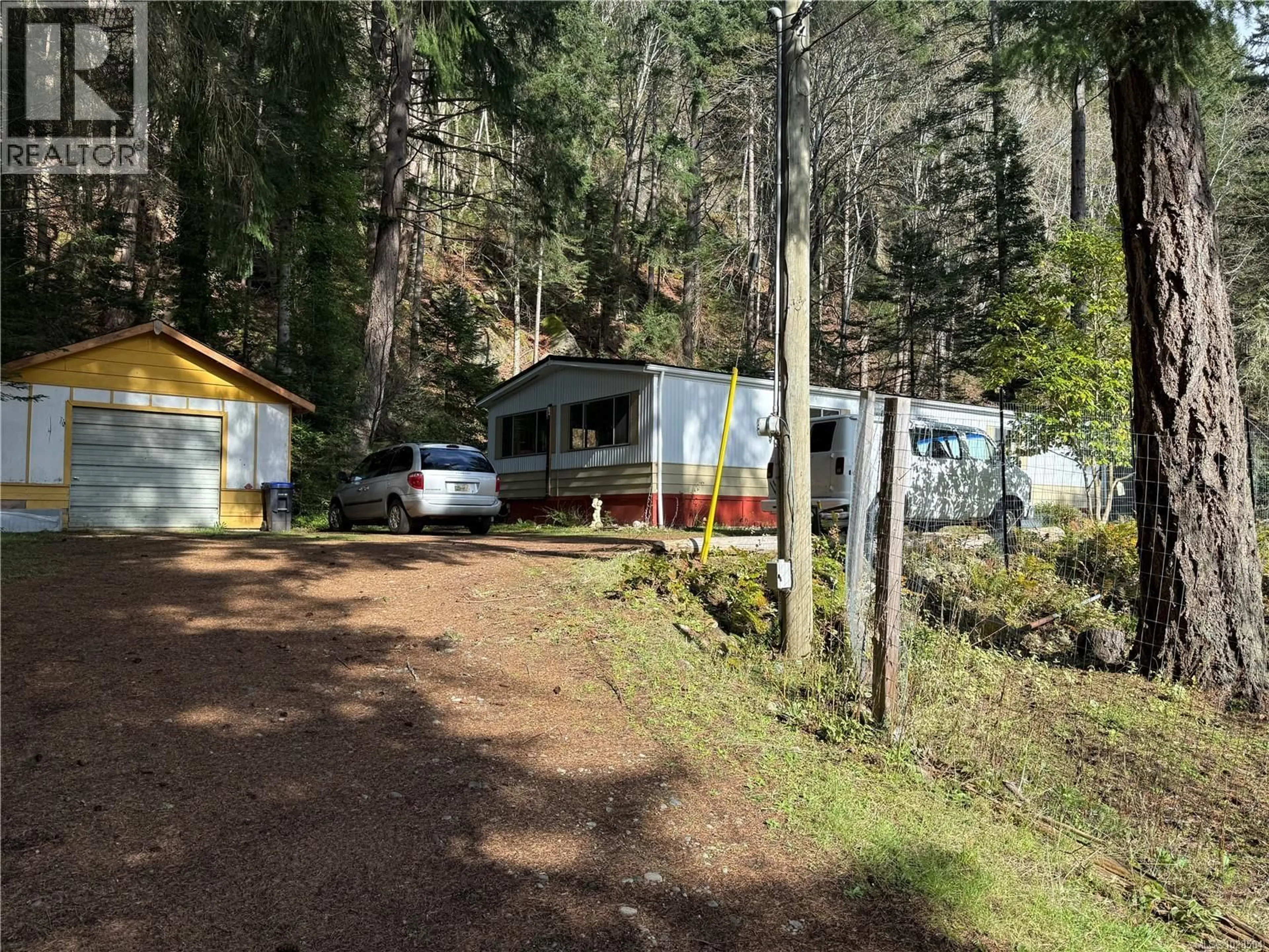 A pic from outside/outdoor area/front of a property/back of a property/a pic from drone, forest/trees view for 1802 OYSTER WAY, Gabriola Island British Columbia V0X1R6