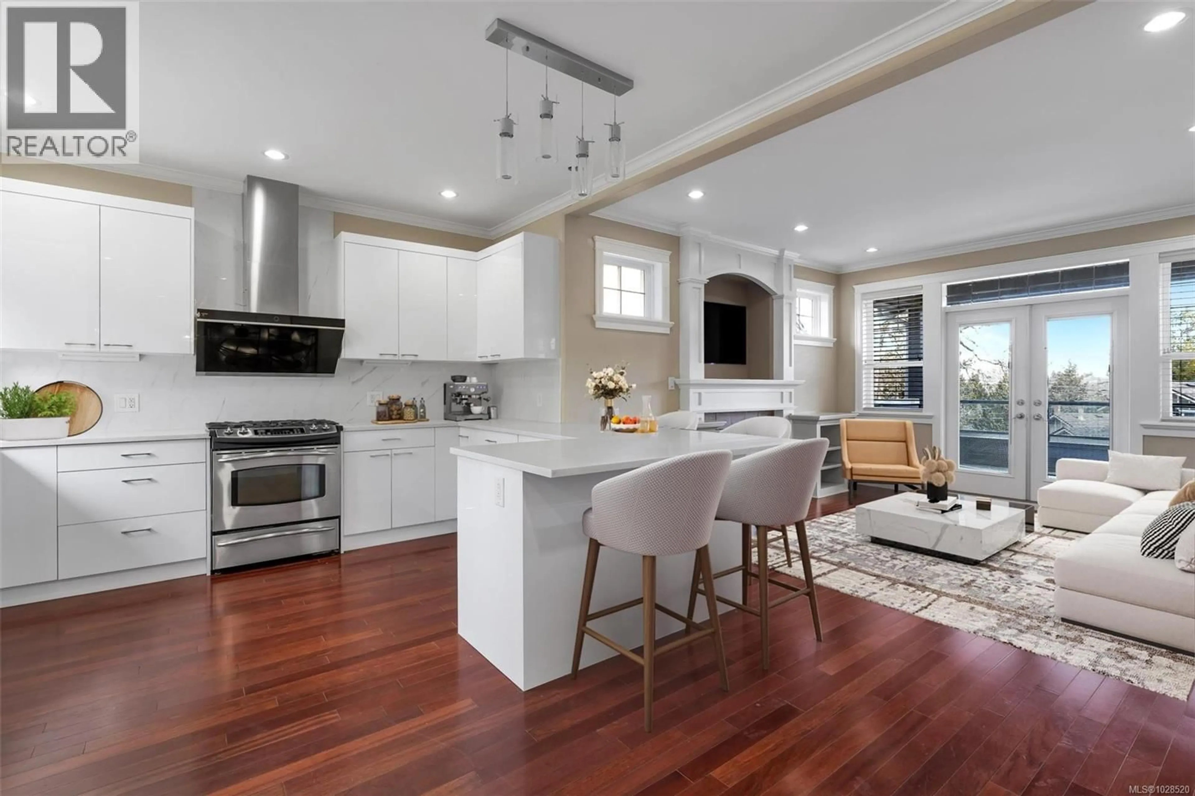 Open concept kitchen, wood/laminate floor for 3924 DRUCE LANE, Saanich British Columbia V8P0A2