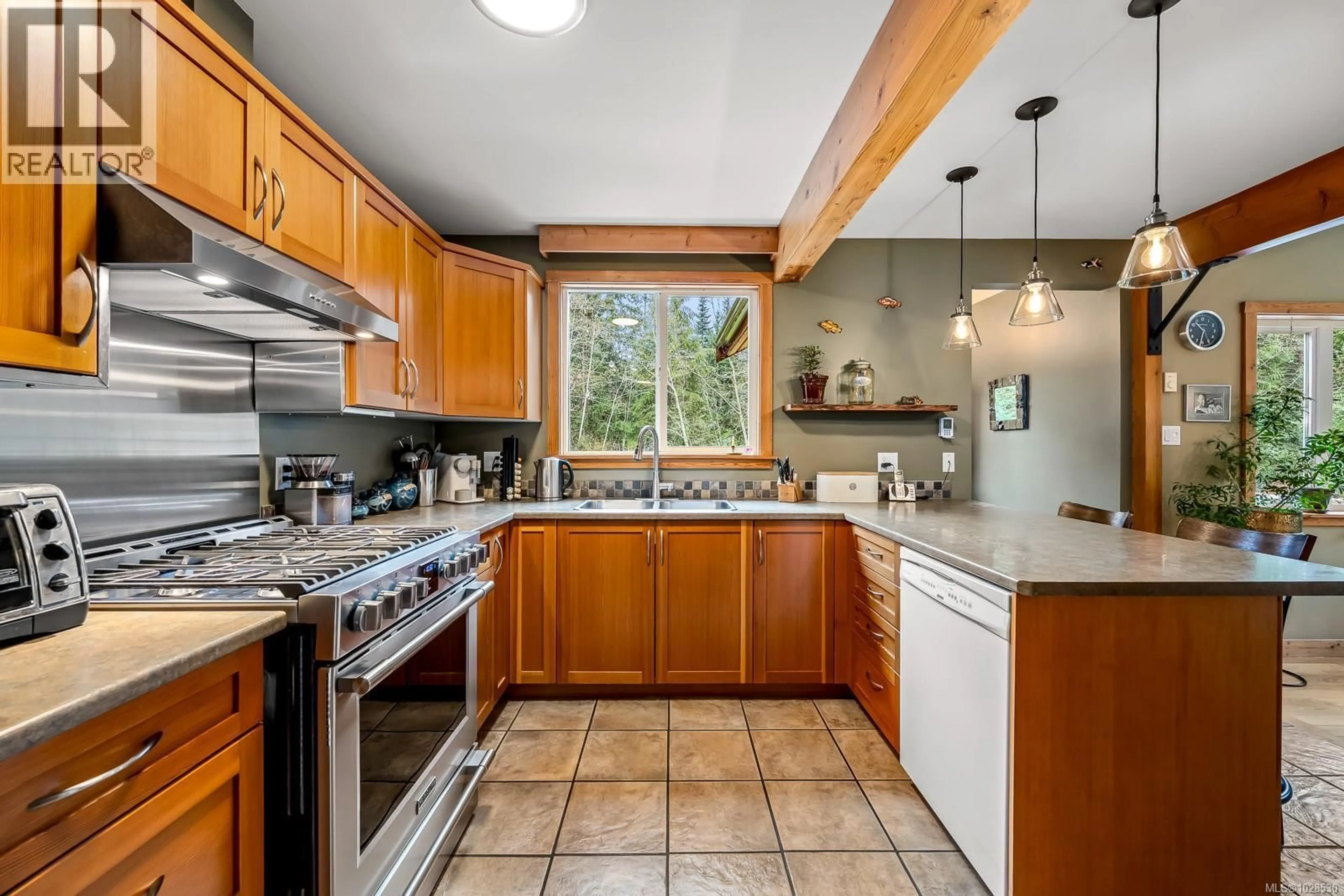 Standard kitchen, ceramic/tile floor for 1590 CARRINGTON BAY ROAD, Whaletown British Columbia V0P1Z0