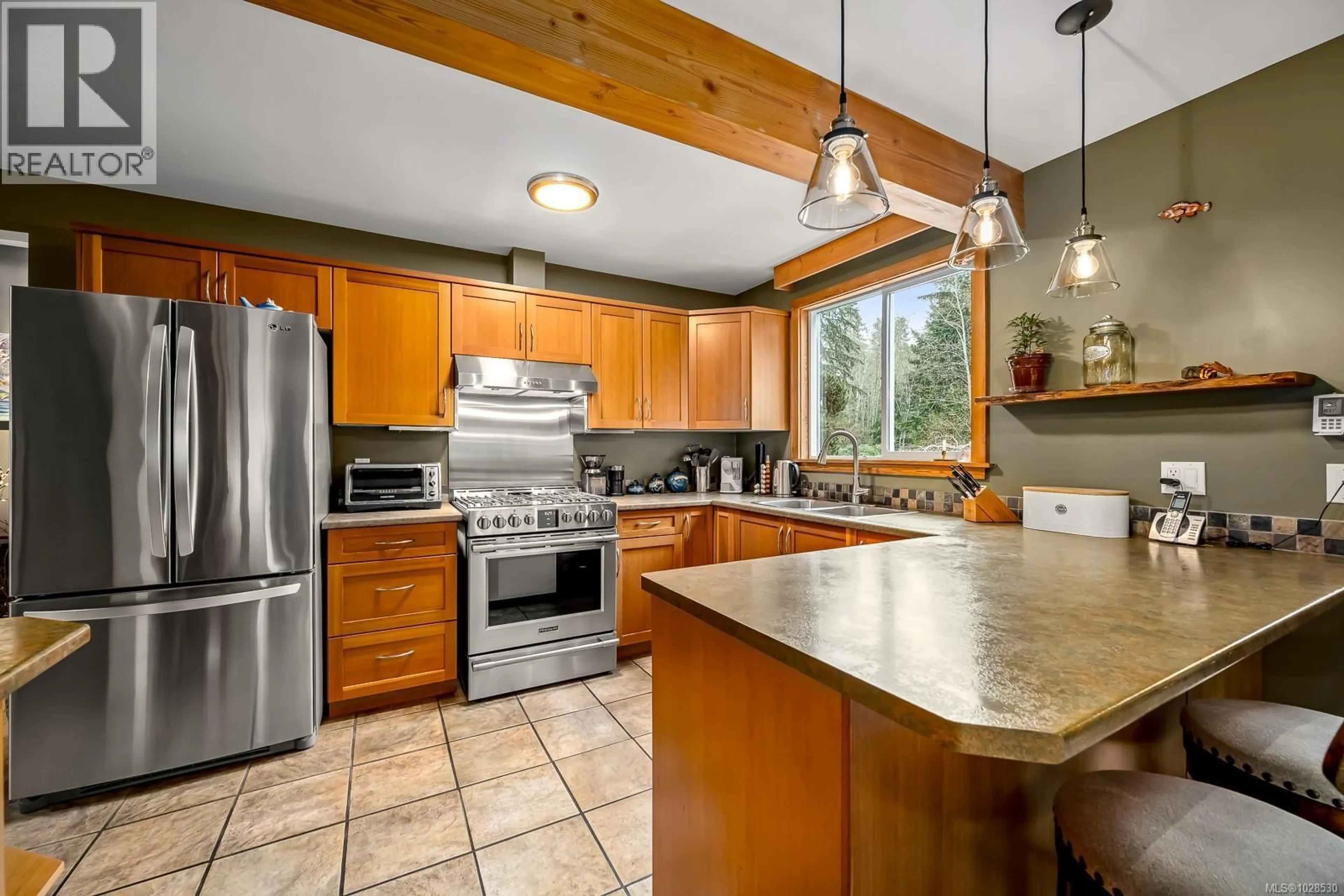 Open concept kitchen, unknown for 1590 CARRINGTON BAY ROAD, Whaletown British Columbia V0P1Z0
