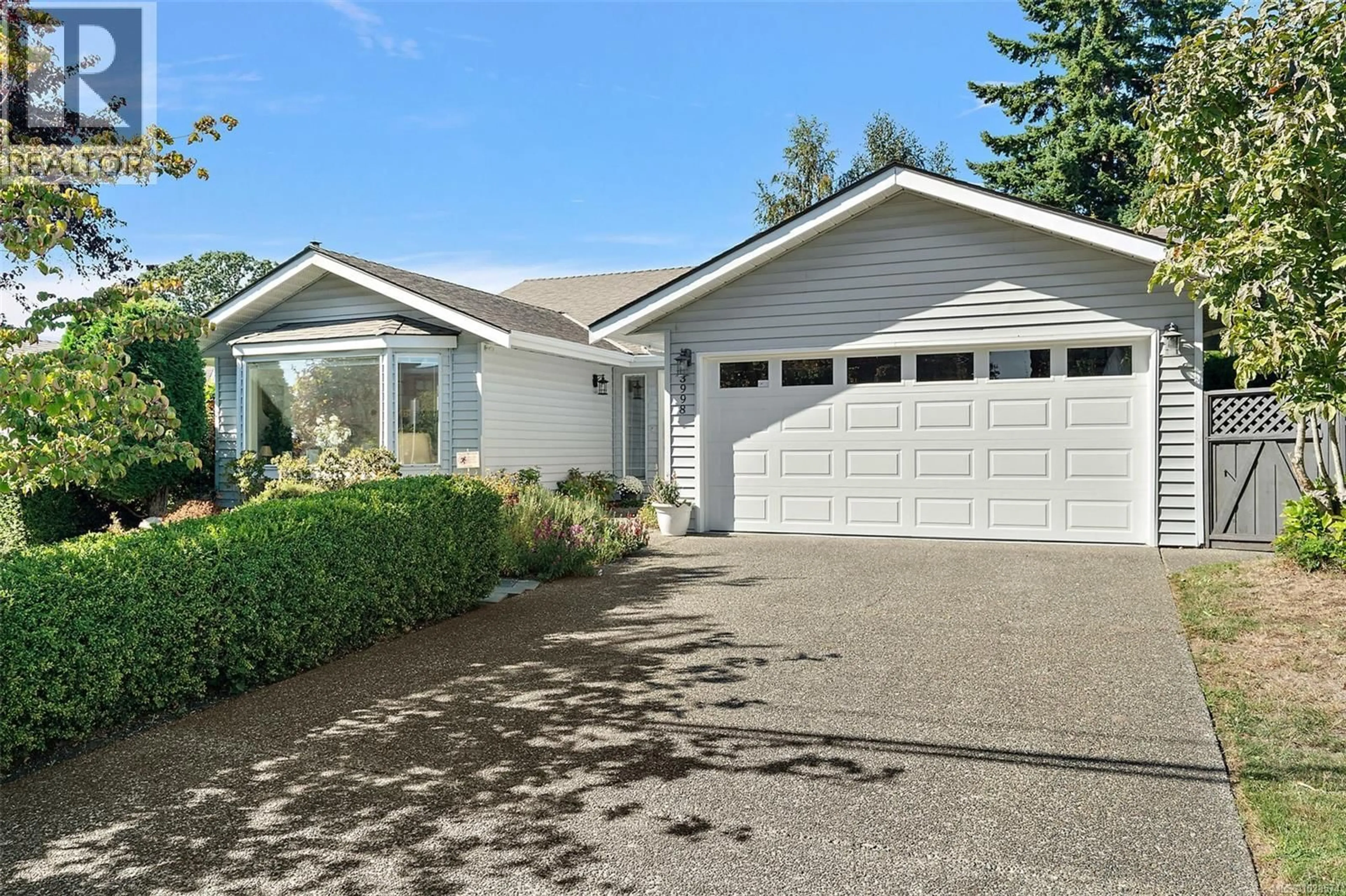 Home with vinyl exterior material, street for 3998 CEDAR HILL ROAD, Saanich British Columbia V8N3C1