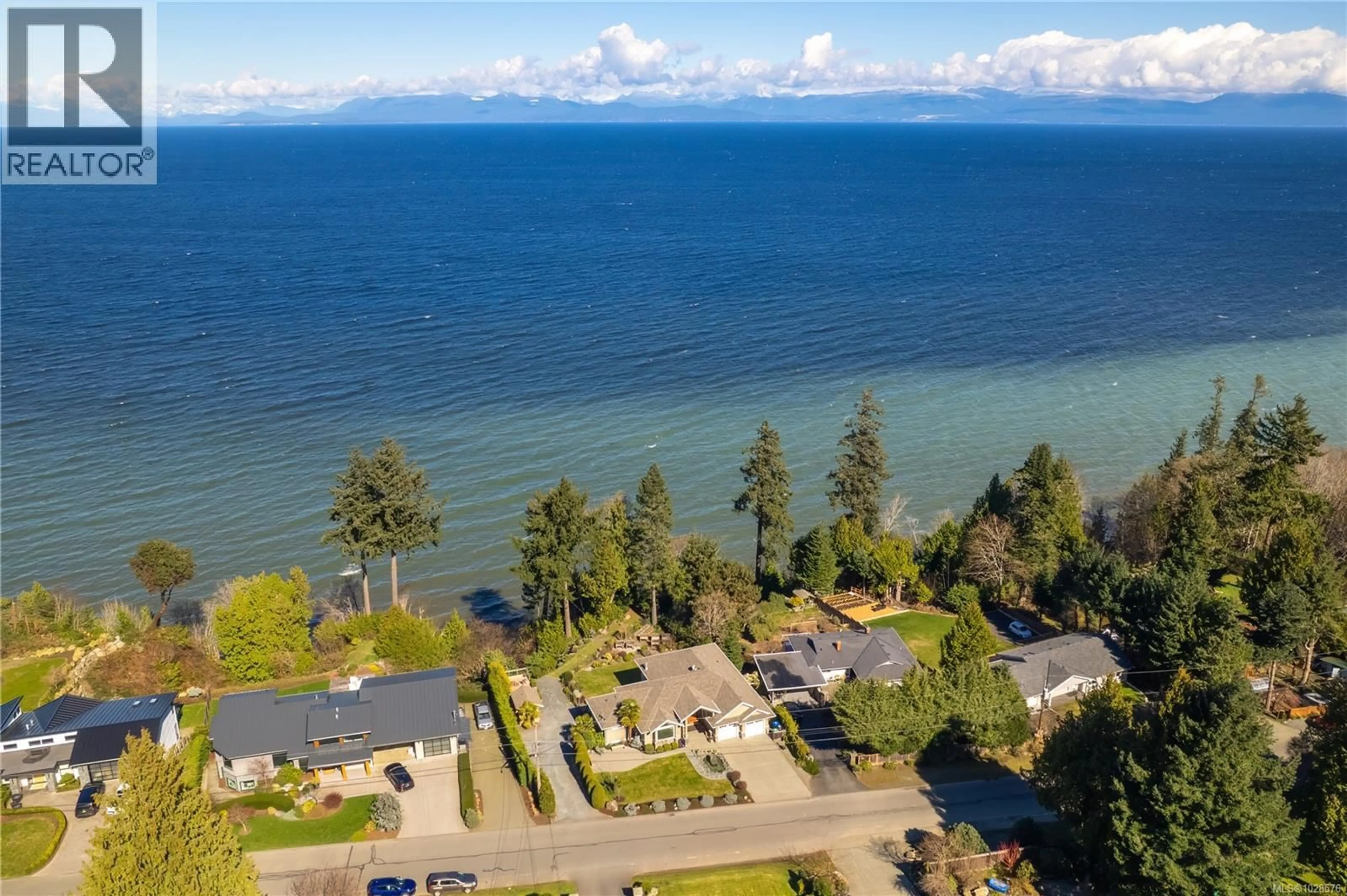 A pic from outside/outdoor area/front of a property/back of a property/a pic from drone, water/lake/river/ocean view for 5450 BAYSHORE DRIVE, Nanaimo British Columbia V9V1G9