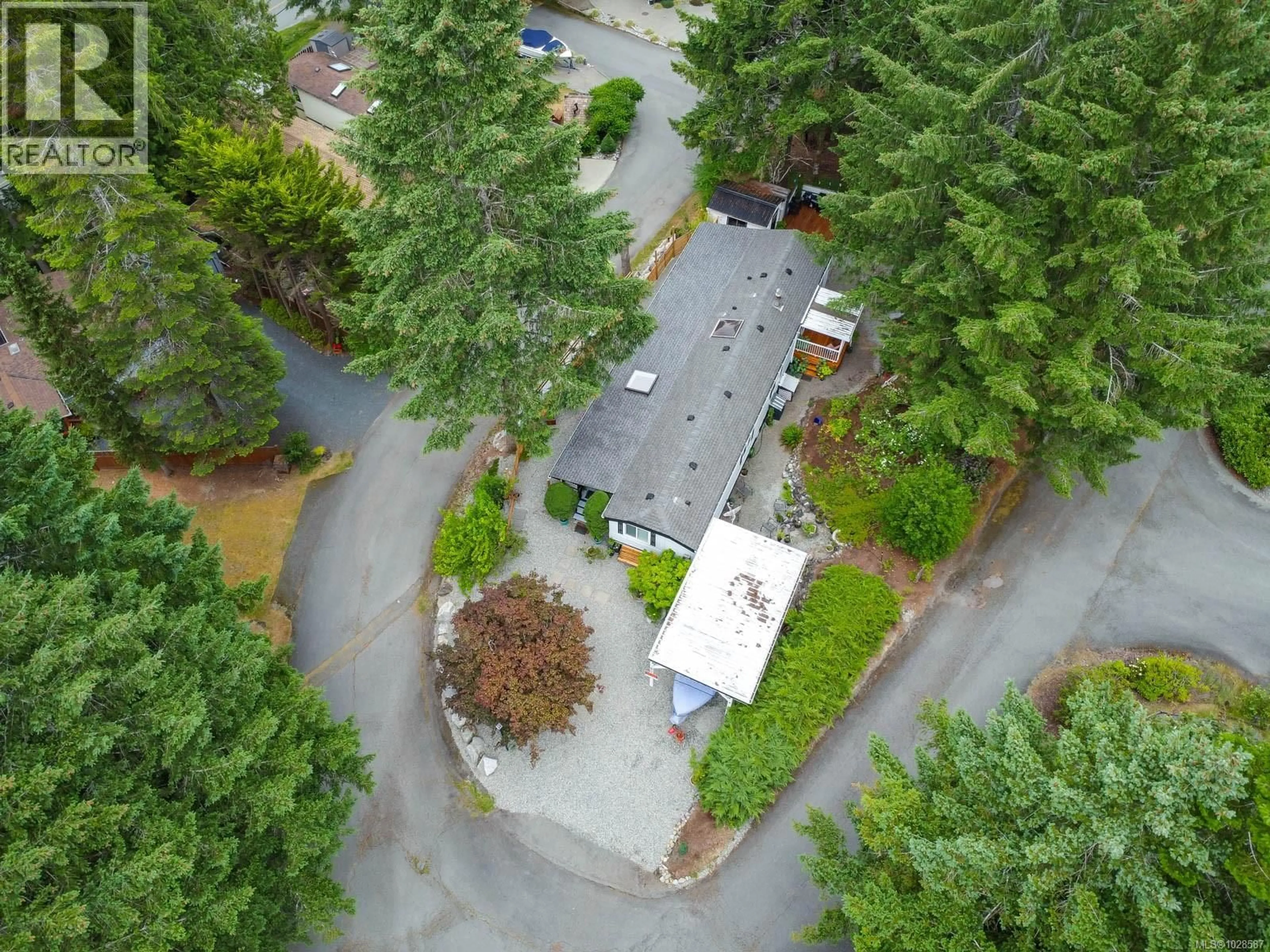 A pic from outside/outdoor area/front of a property/back of a property/a pic from drone, forest/trees view for 77 - 10325 LAKESHORE ROAD, Port Alberni British Columbia V9Y8G9