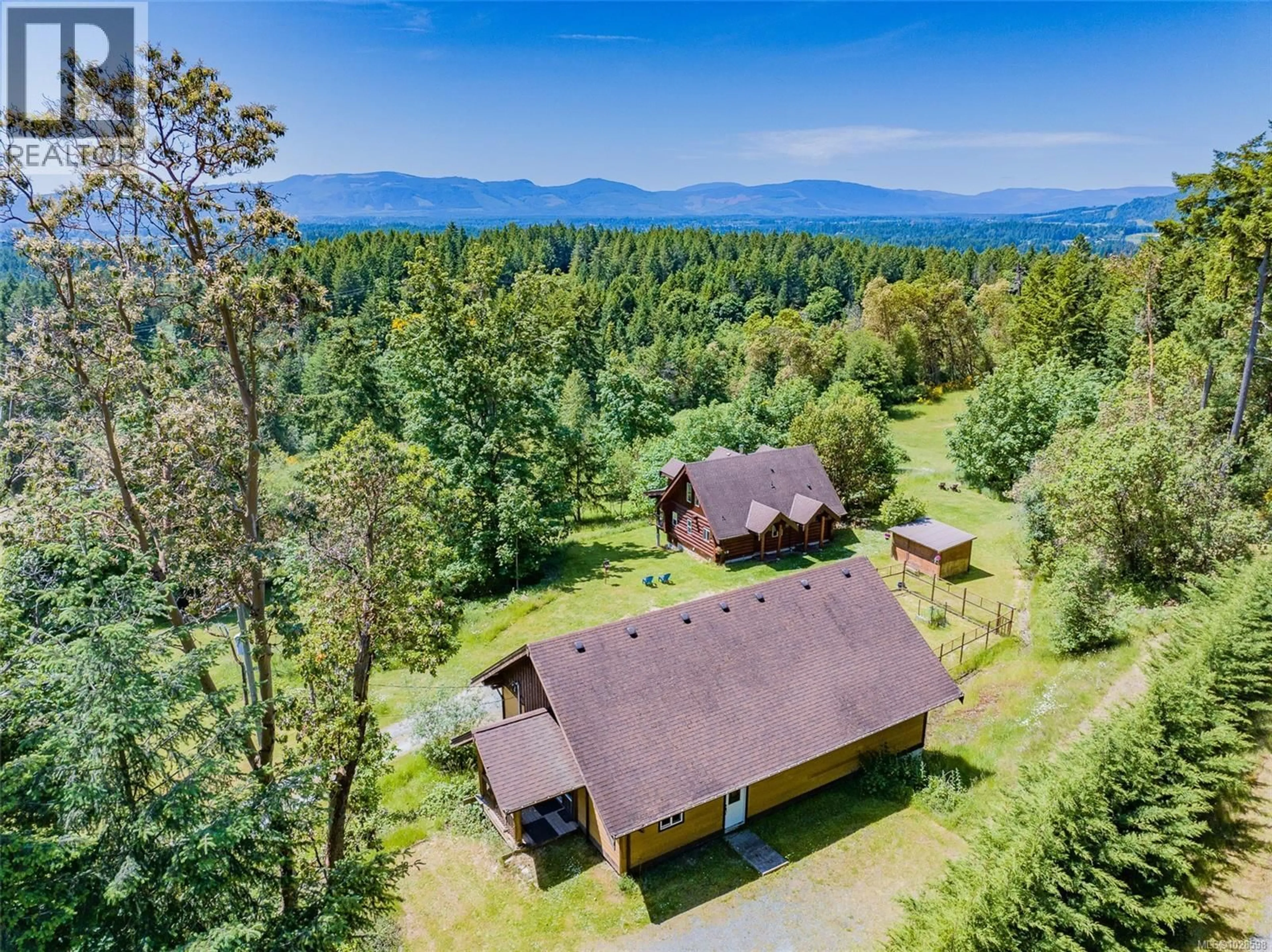 A pic from outside/outdoor area/front of a property/back of a property/a pic from drone, mountain view for 7337 ALBERTA PLACE, Duncan British Columbia V9L5W8