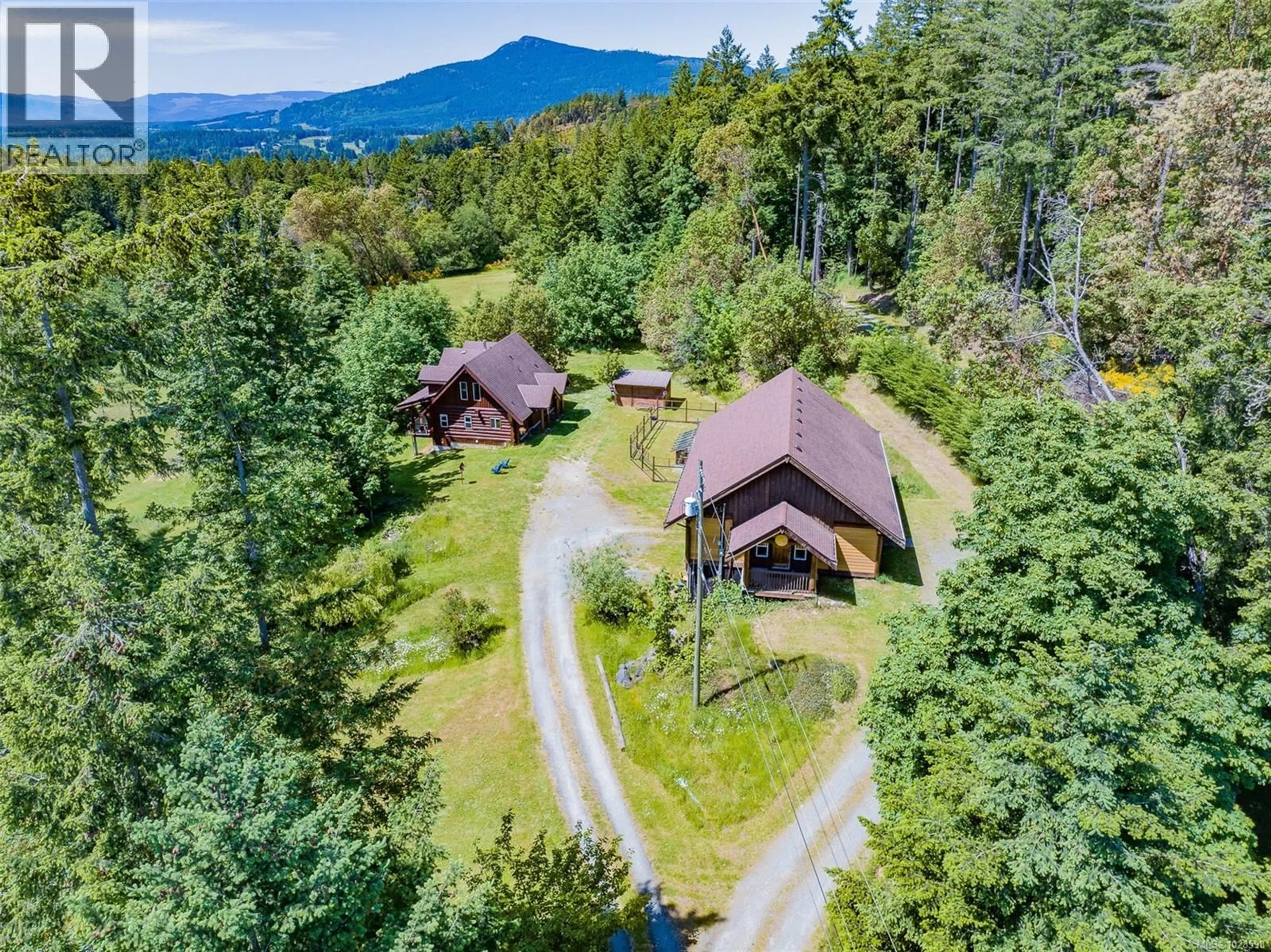 A pic from outside/outdoor area/front of a property/back of a property/a pic from drone, mountain view for 7337 ALBERTA PLACE, Duncan British Columbia V9L5W8