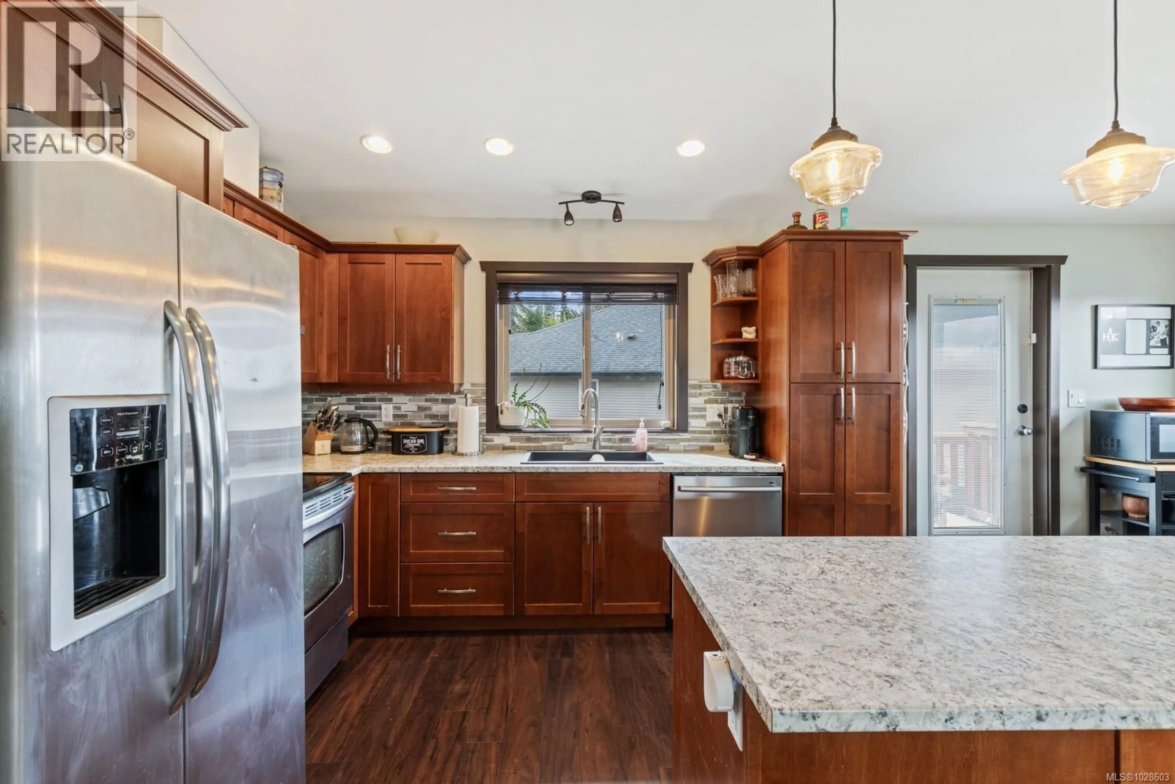 Open concept kitchen, unknown for 2735 RYDAL AVENUE, Cumberland British Columbia V0R1S0