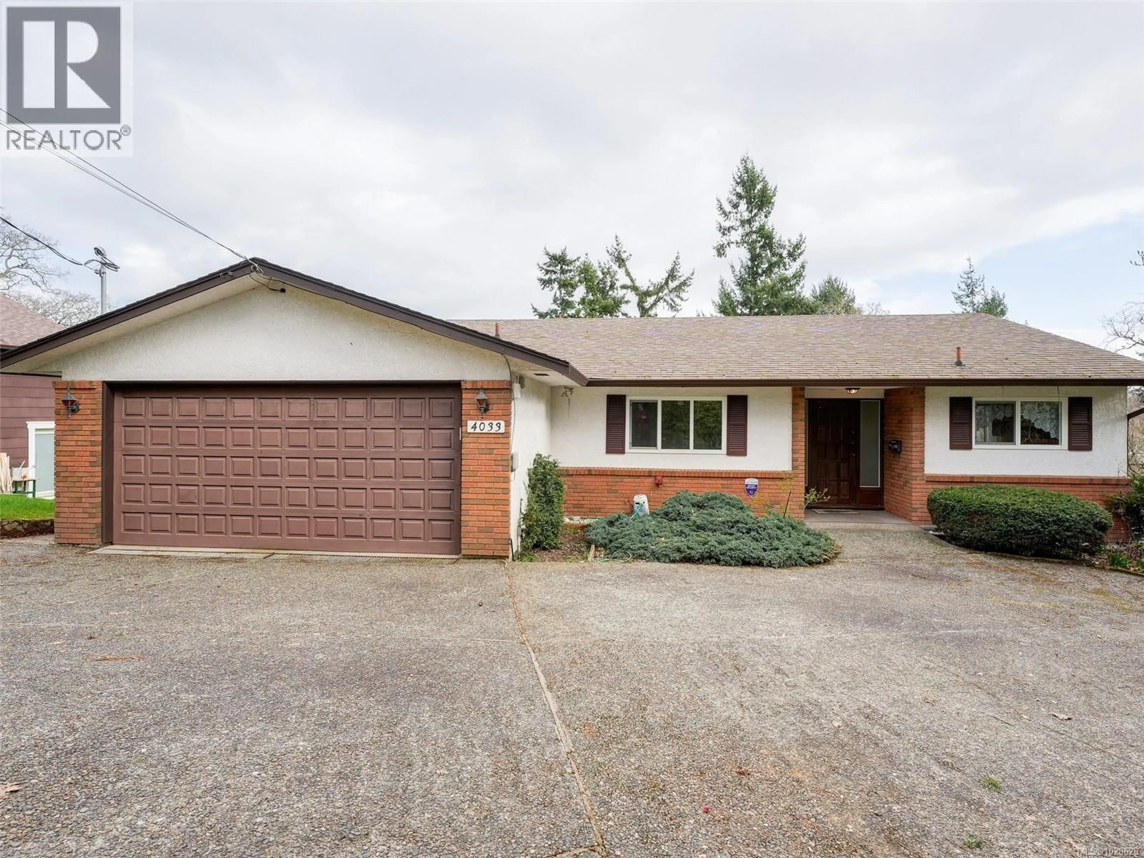 Home with brick exterior material, street for 4033 ZINNIA ROAD, Saanich British Columbia V8Z4W2