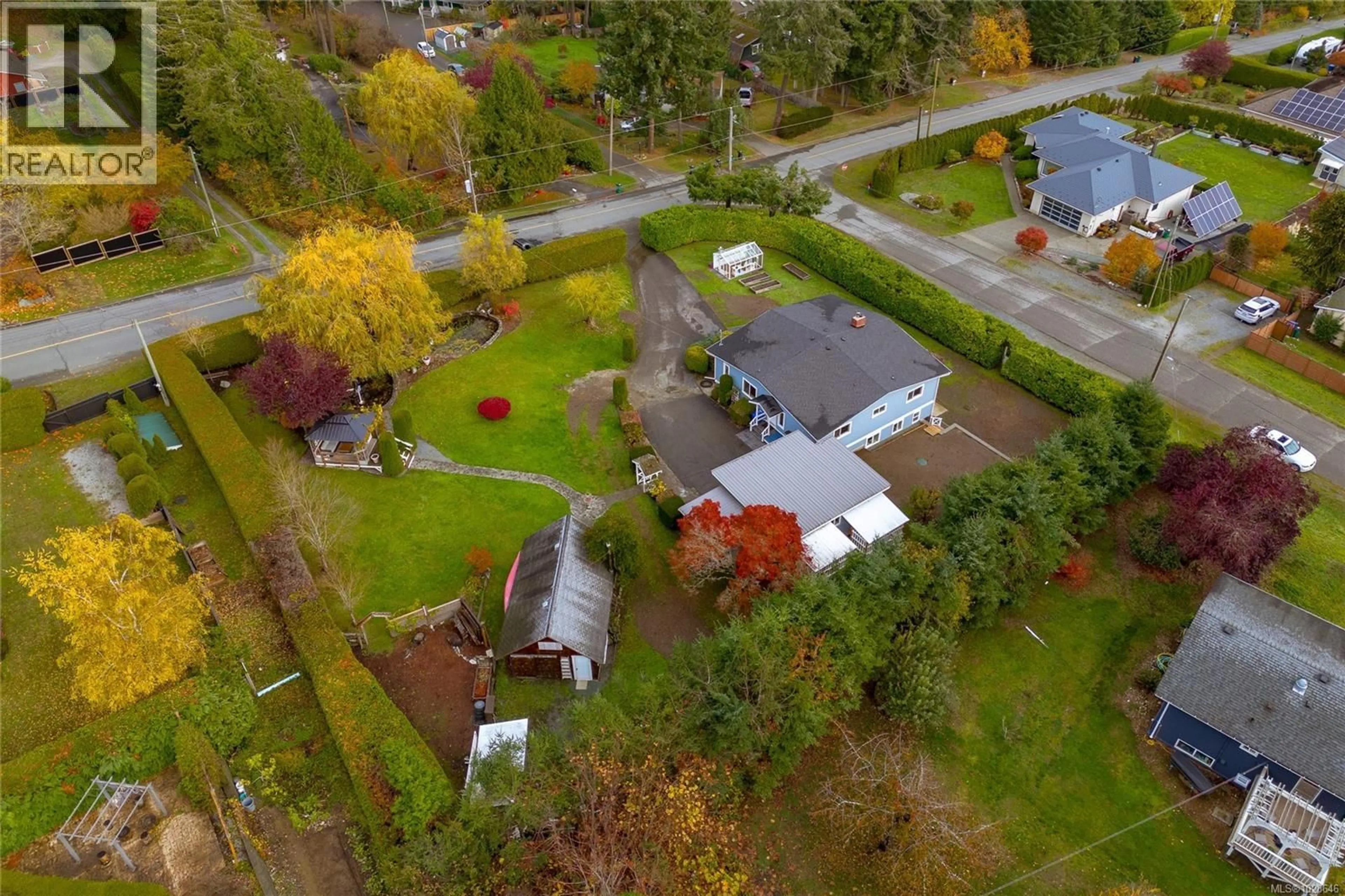 A pic from outside/outdoor area/front of a property/back of a property/a pic from drone, street for 660 FRAYNE ROAD, Mill Bay British Columbia V8H1C3