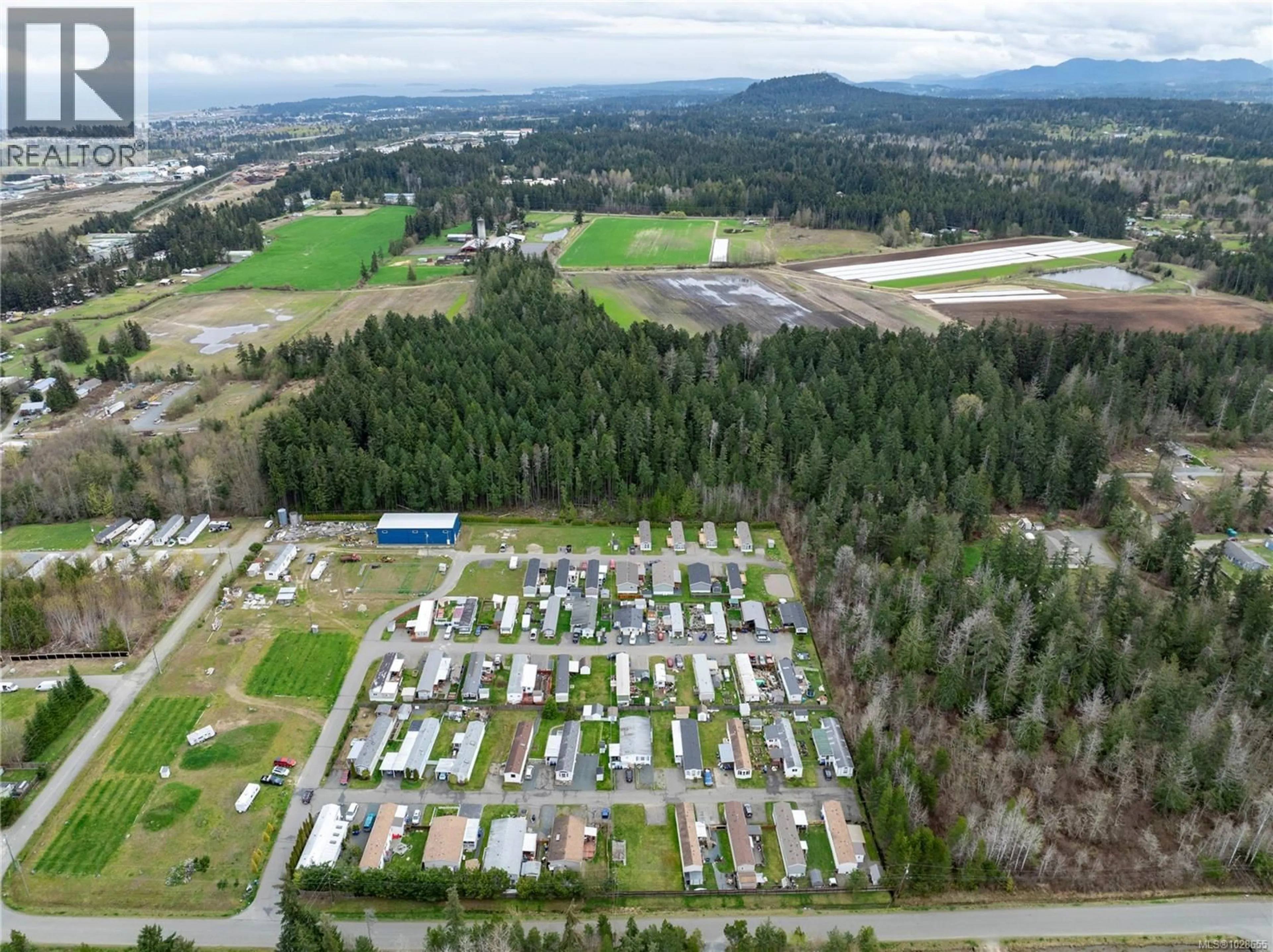 A pic from outside/outdoor area/front of a property/back of a property/a pic from drone, mountain view for 47 - 1720 WHIBLEY ROAD, Coombs British Columbia V0R1M0