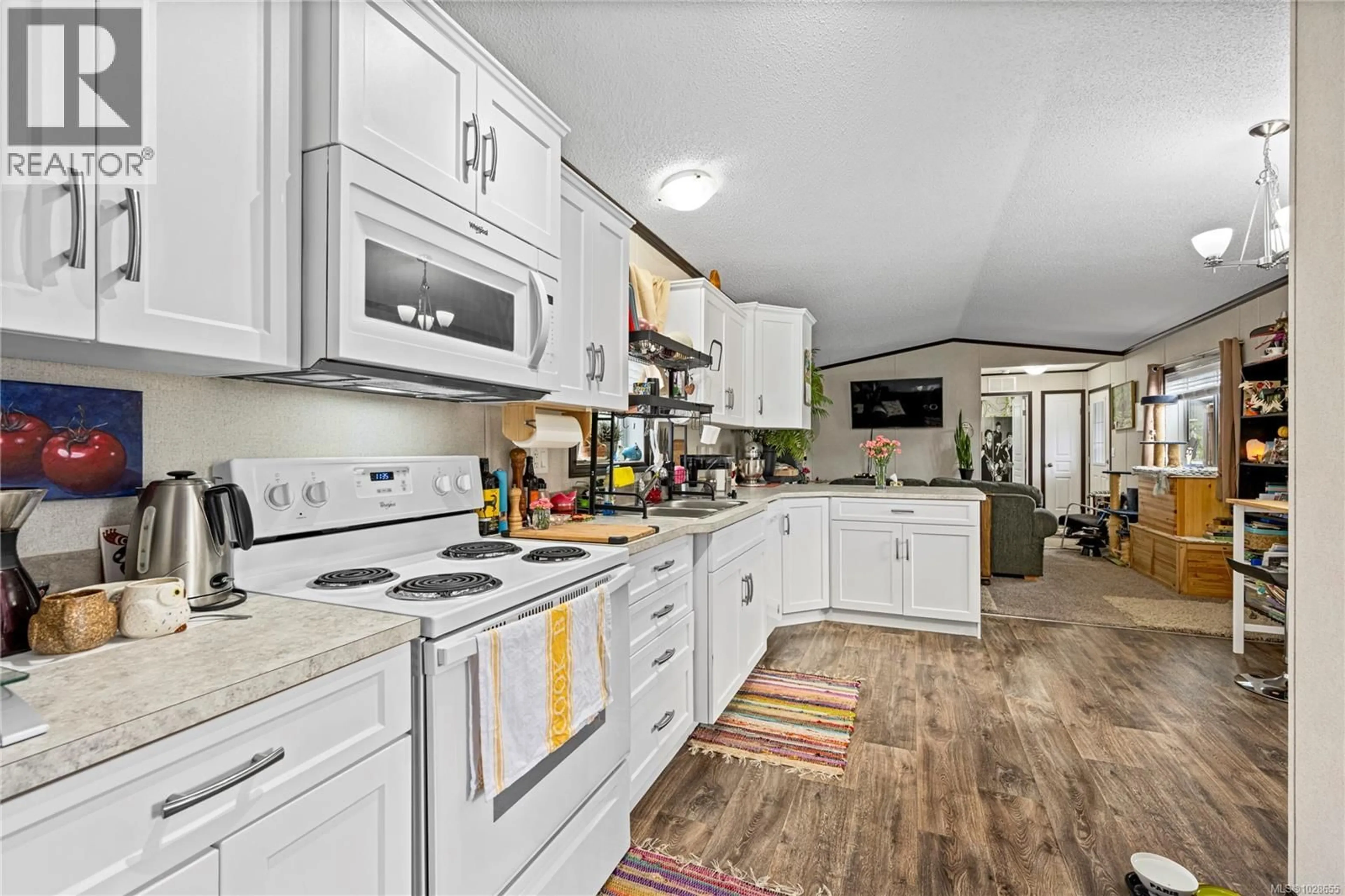 Open concept kitchen, ceramic/tile floor for 47 - 1720 WHIBLEY ROAD, Coombs British Columbia V0R1M0