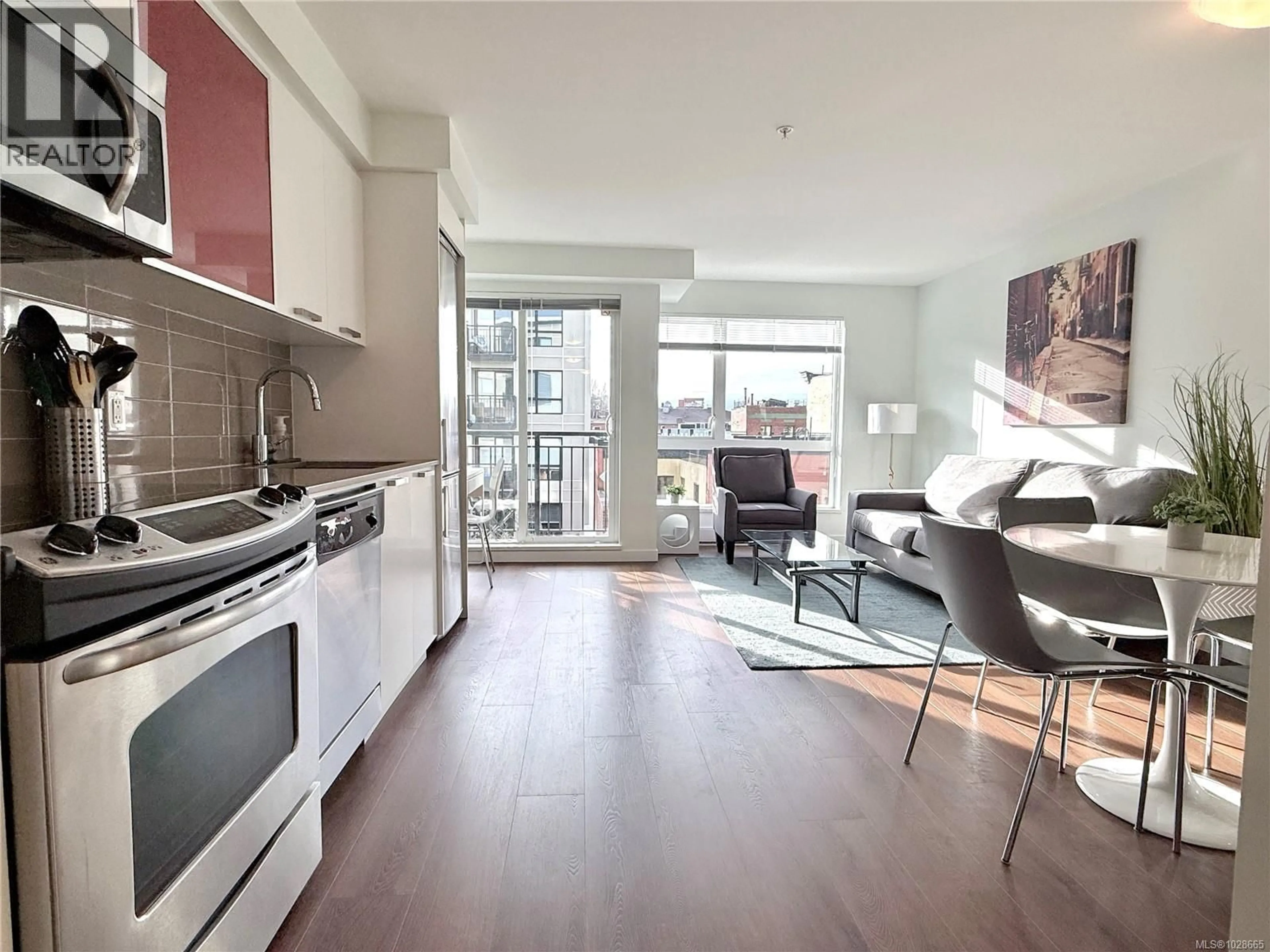 Open concept kitchen, wood/laminate floor for 310 - 517 FISGARD STREET, Victoria British Columbia V8W0C5