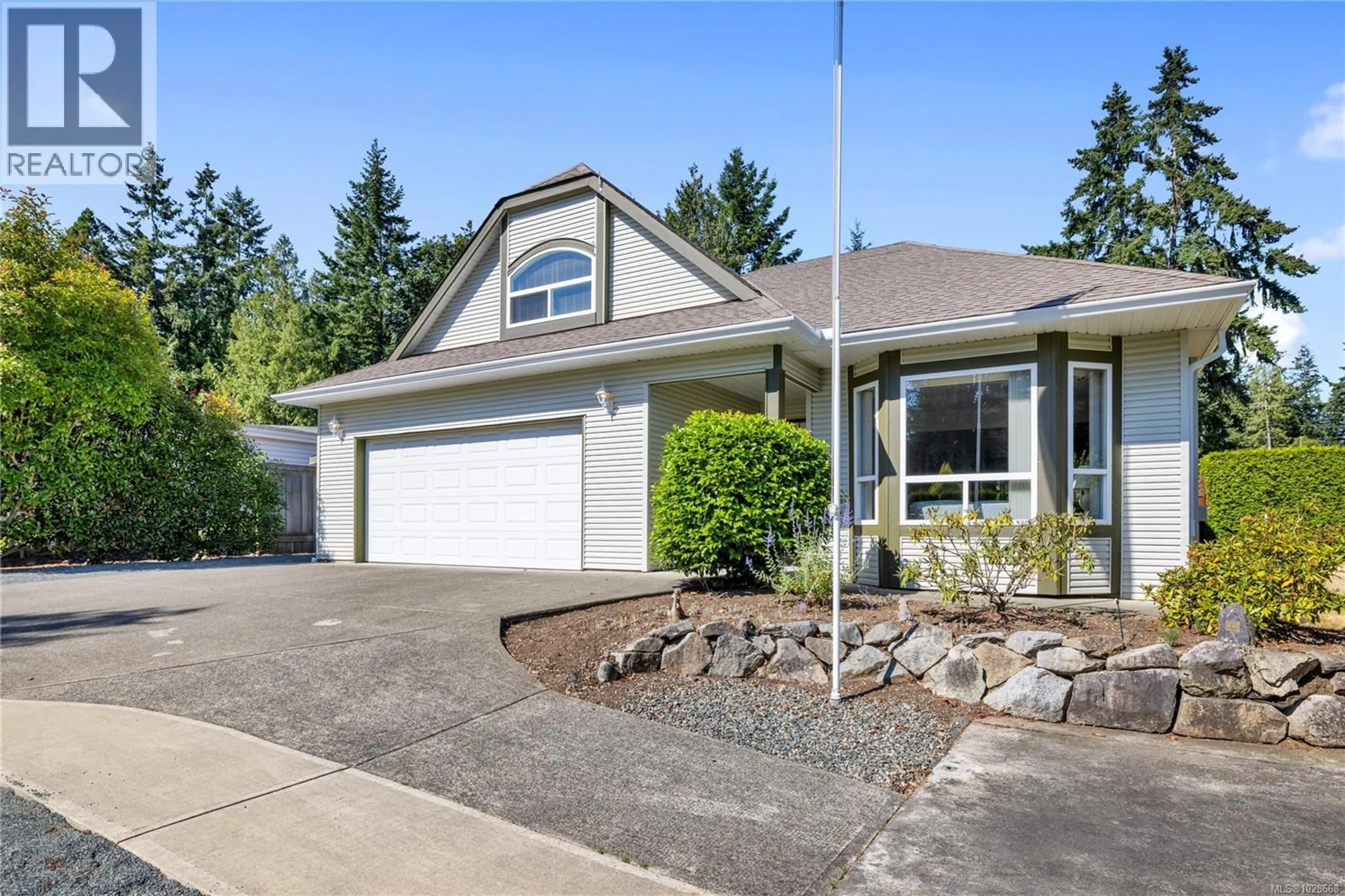 Home with vinyl exterior material, street for 726 DREW ROAD, Parksville British Columbia V9P1X3