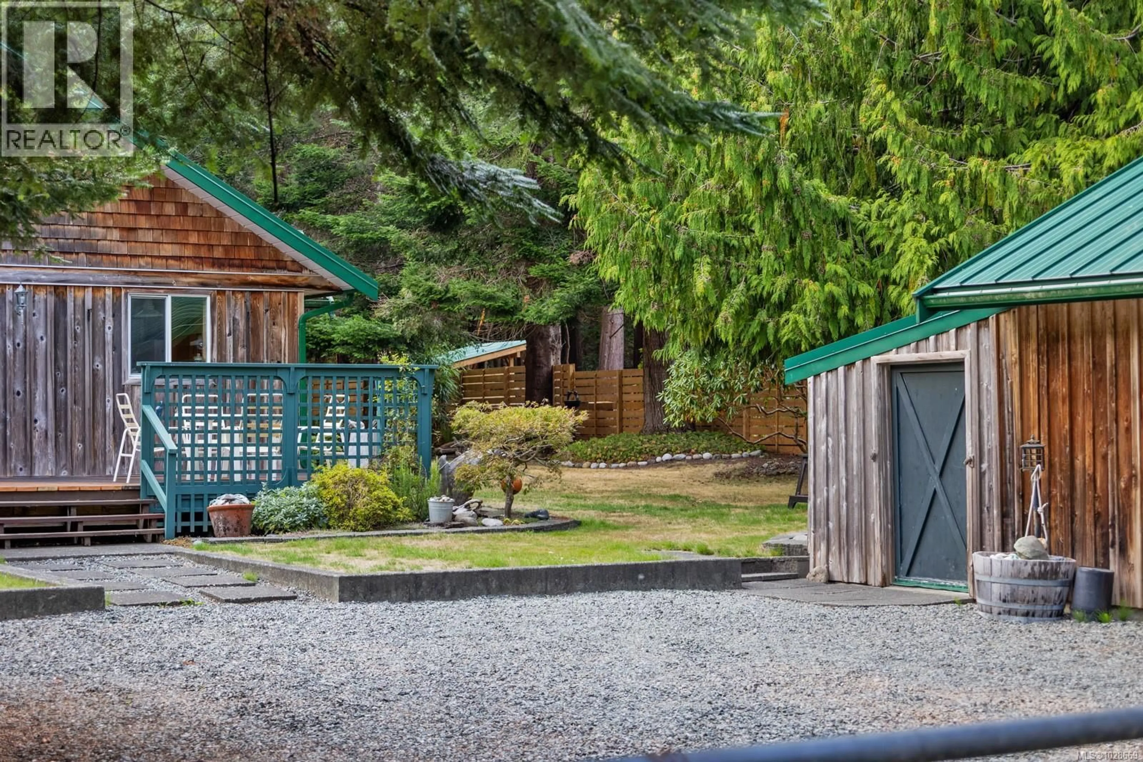 A pic from outside/outdoor area/front of a property/back of a property/a pic from drone, mountain view for 1655 BAIKIE ROAD, Denman Island British Columbia V0R1T0