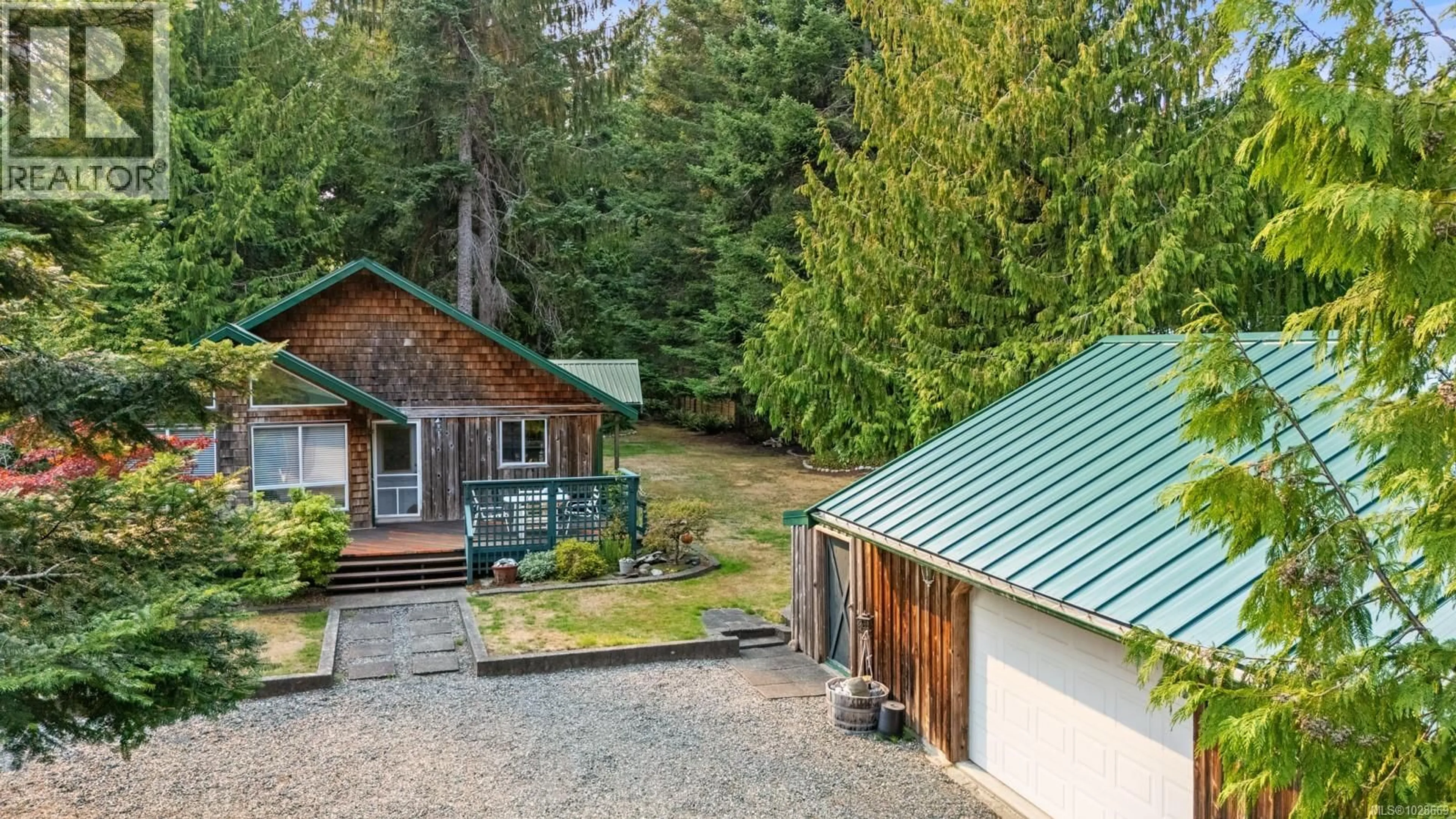 A pic from outside/outdoor area/front of a property/back of a property/a pic from drone, unknown for 1655 BAIKIE ROAD, Denman Island British Columbia V0R1T0