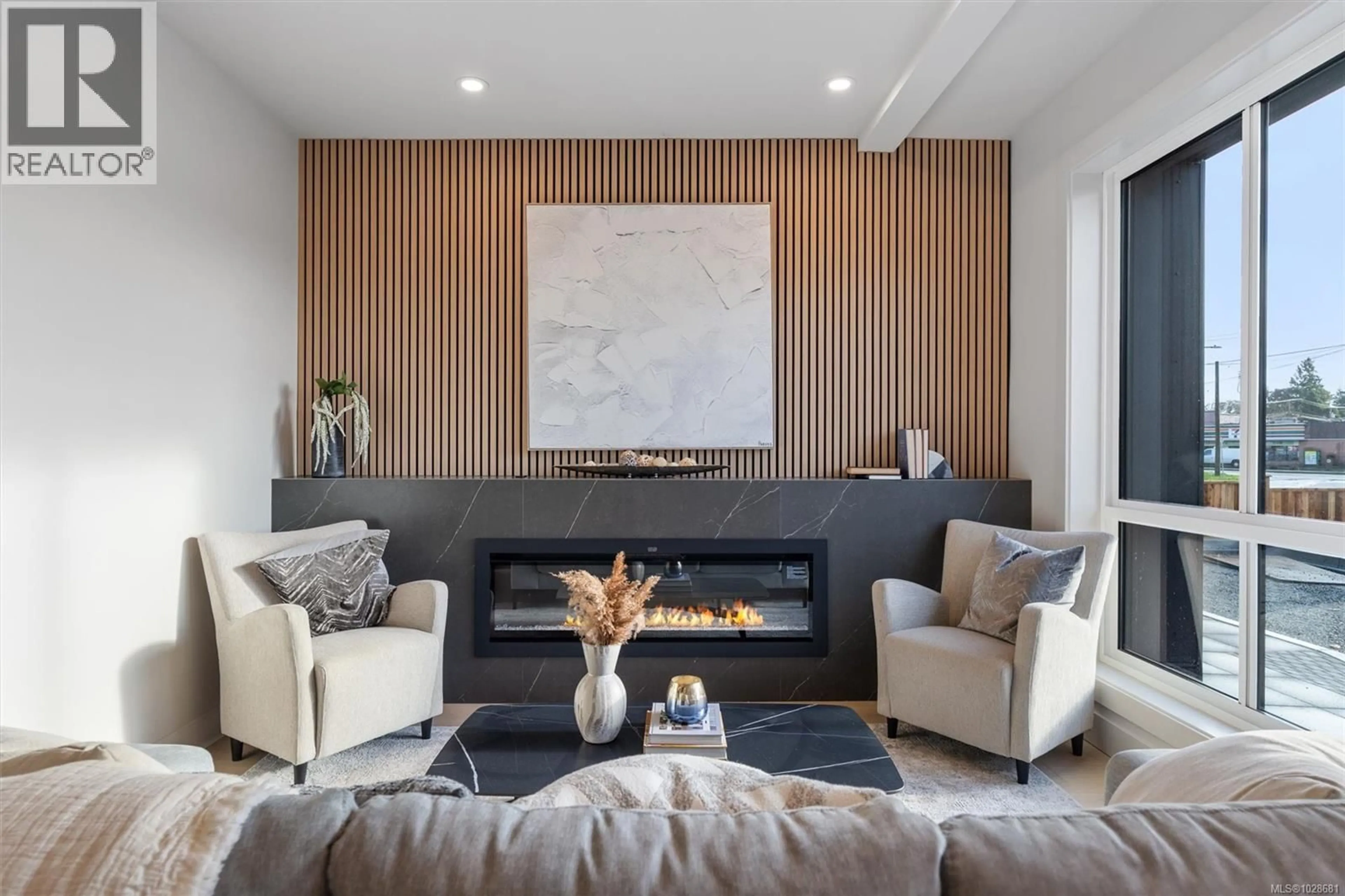 Living room with furniture, wood/laminate floor for 2 - 588 WHITESIDE STREET, Saanich British Columbia V8Z1Y6