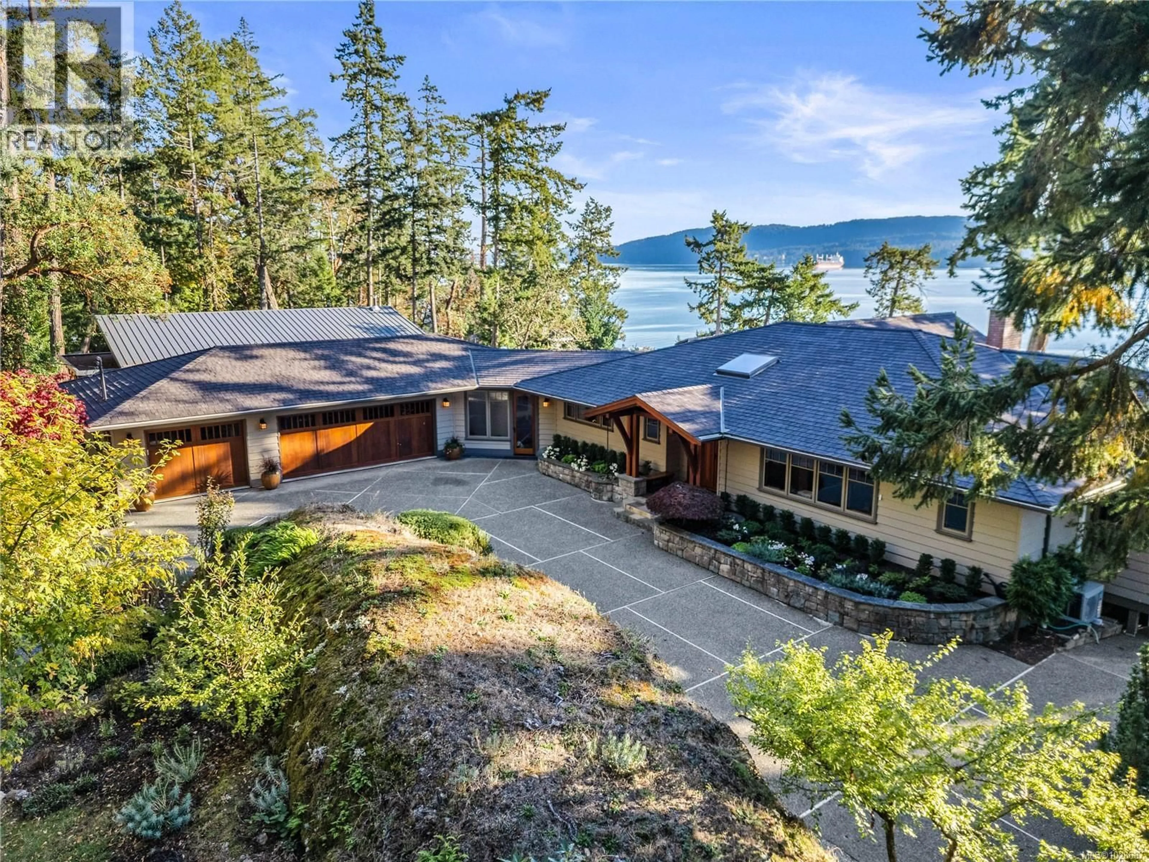 A pic from outside/outdoor area/front of a property/back of a property/a pic from drone, water/lake/river/ocean view for 220 SCOTT POINT DRIVE, Salt Spring British Columbia V8K2R1