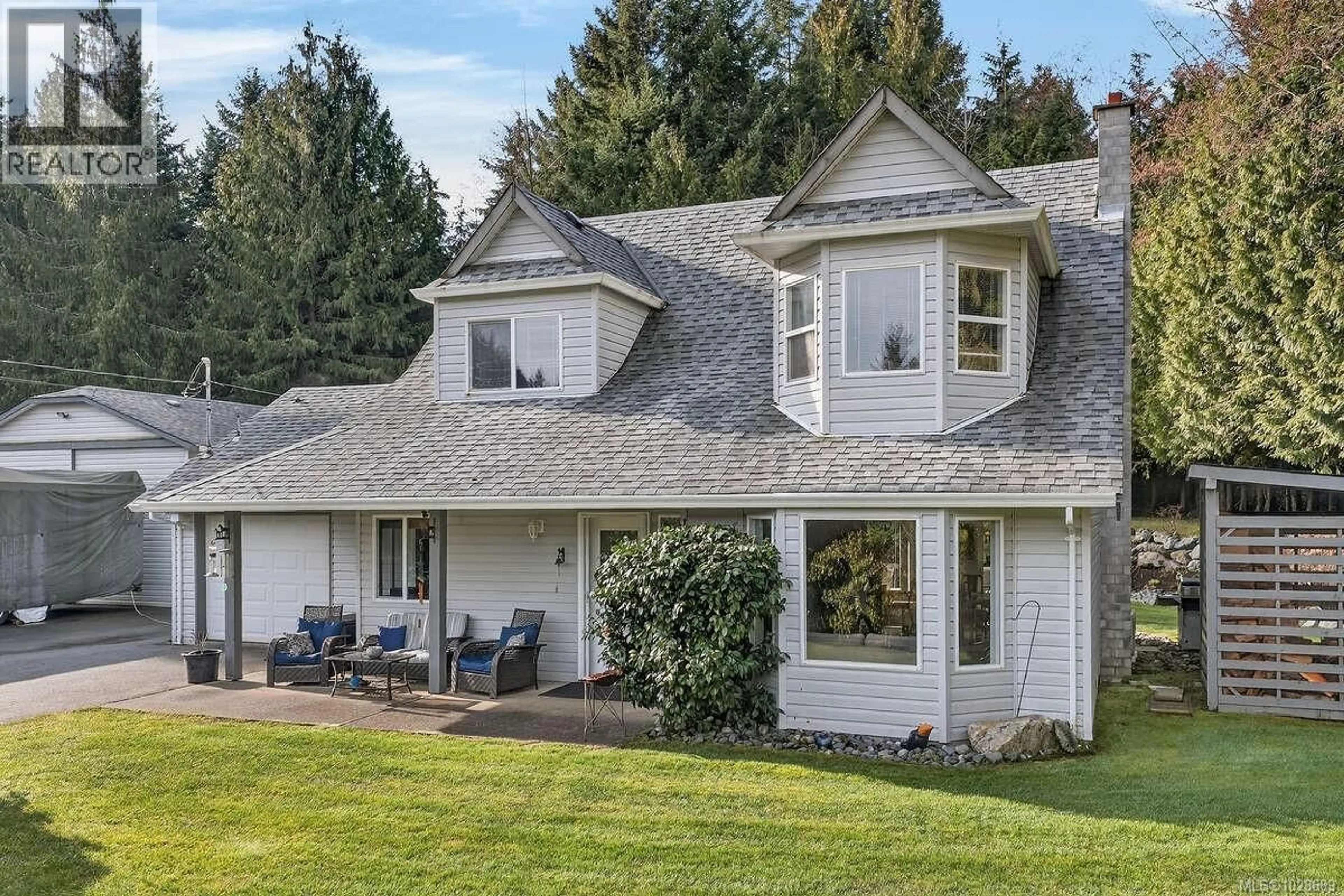 Home with vinyl exterior material, mountain view for 1136 CORCAN ROAD, Qualicum Beach British Columbia V9K2R6