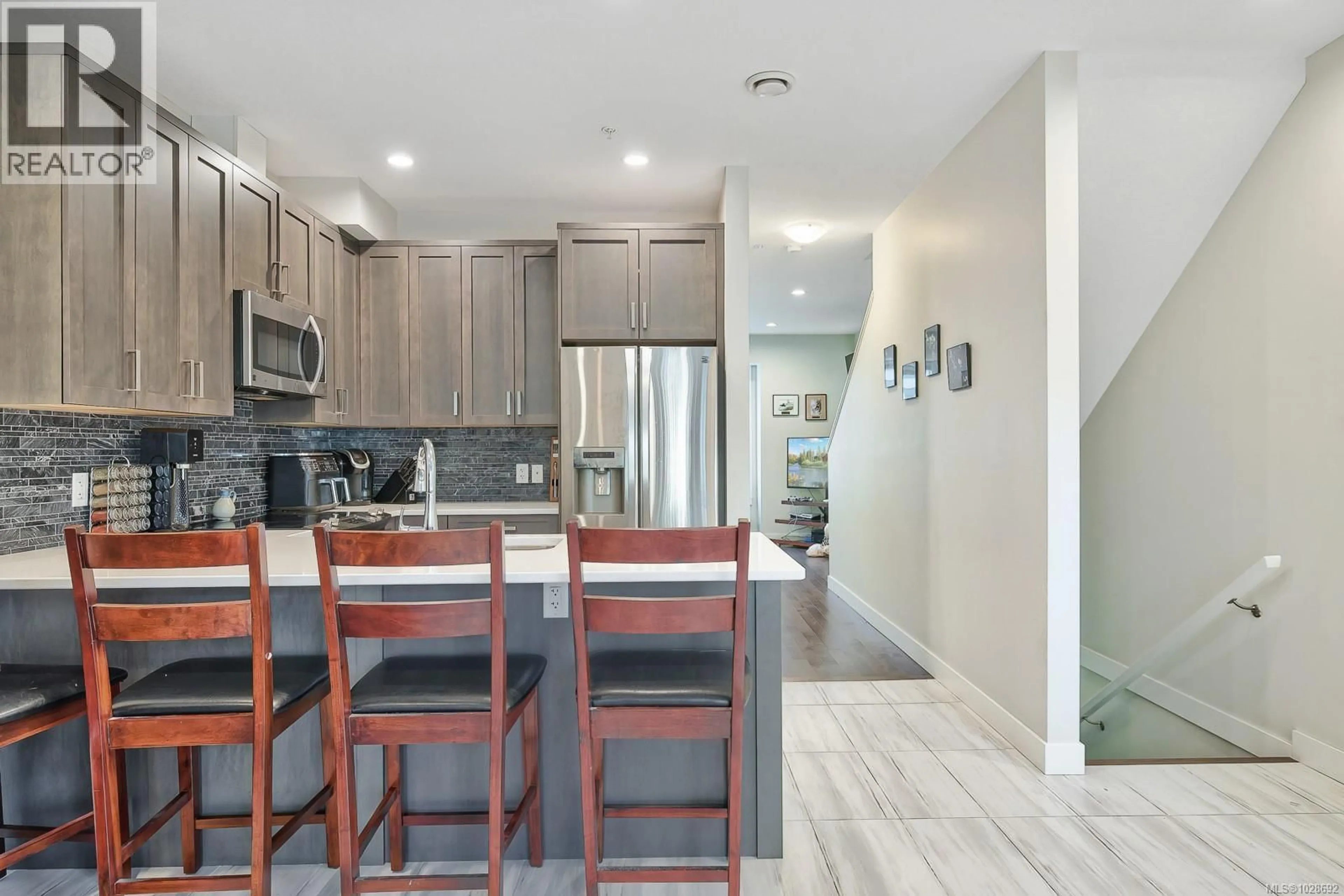 Open concept kitchen, ceramic/tile floor for 128 - 6057 DOUMONT ROAD, Nanaimo British Columbia V9T0G3