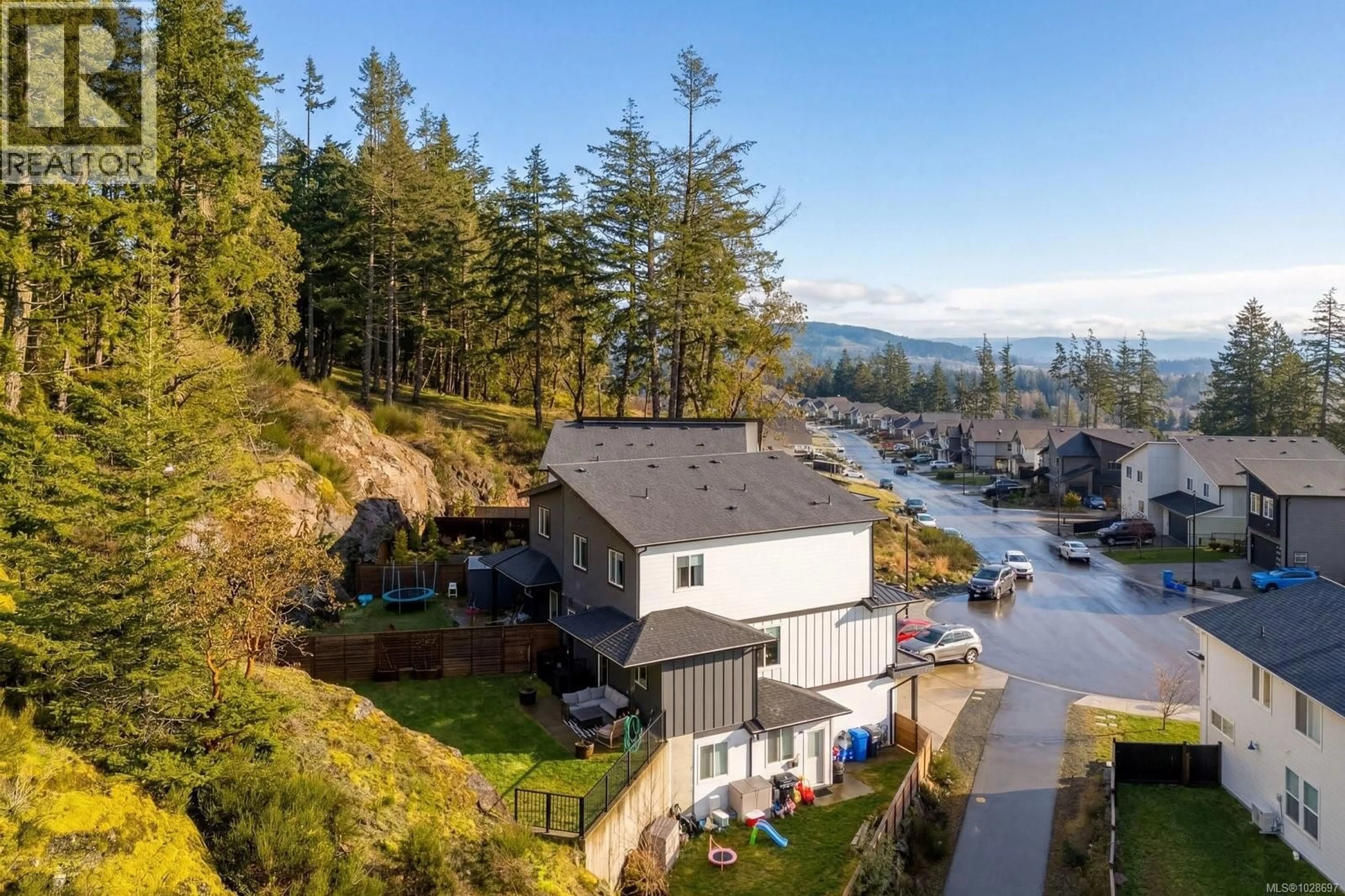 A pic from outside/outdoor area/front of a property/back of a property/a pic from drone, water/lake/river/ocean view for 2168 MOUNTAIN HEIGHTS DRIVE, Sooke British Columbia V9Z1M4