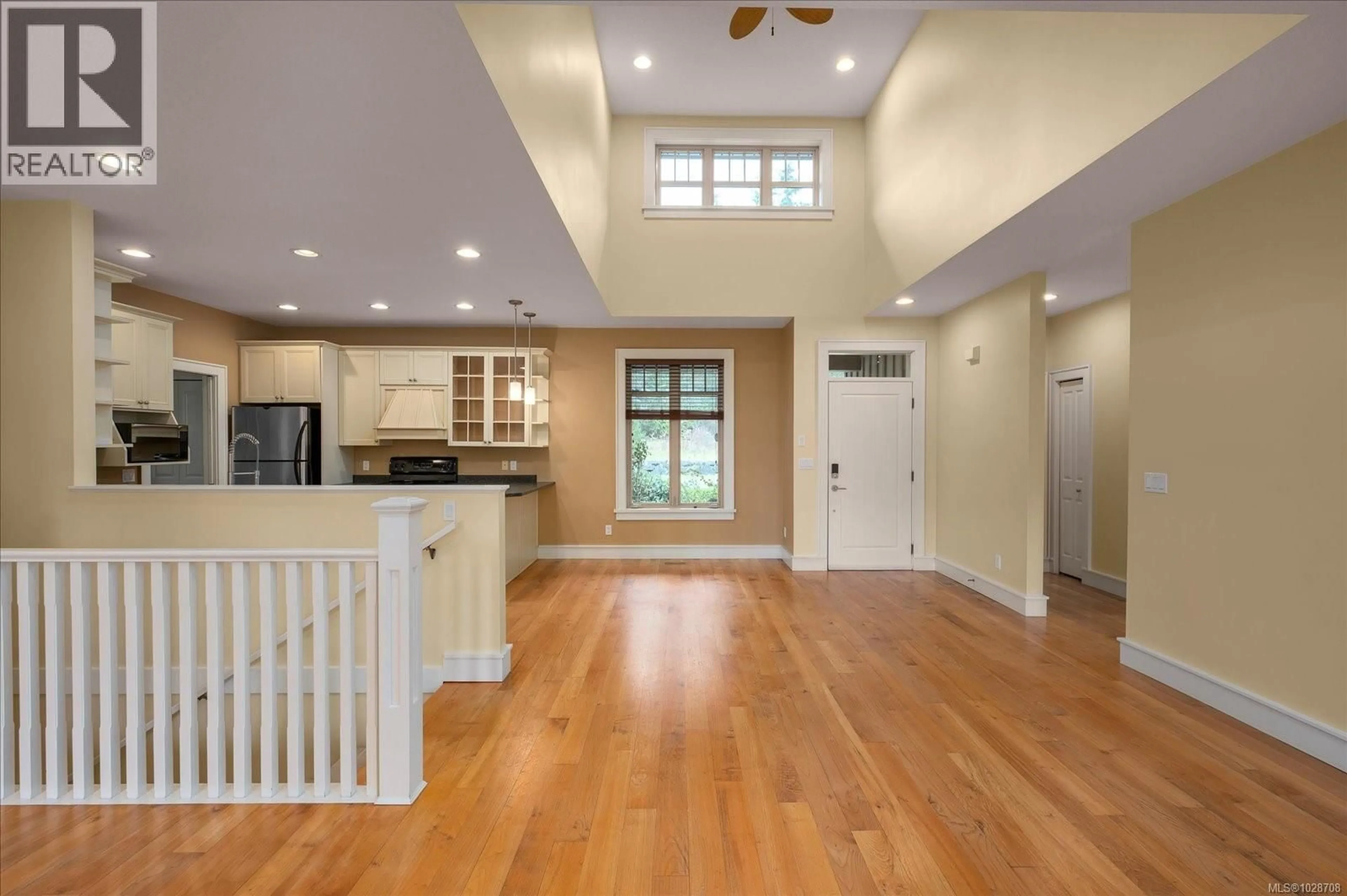 Open concept kitchen, wood/laminate floor for 8 TRILL DRIVE, Parksville British Columbia V9P2W6