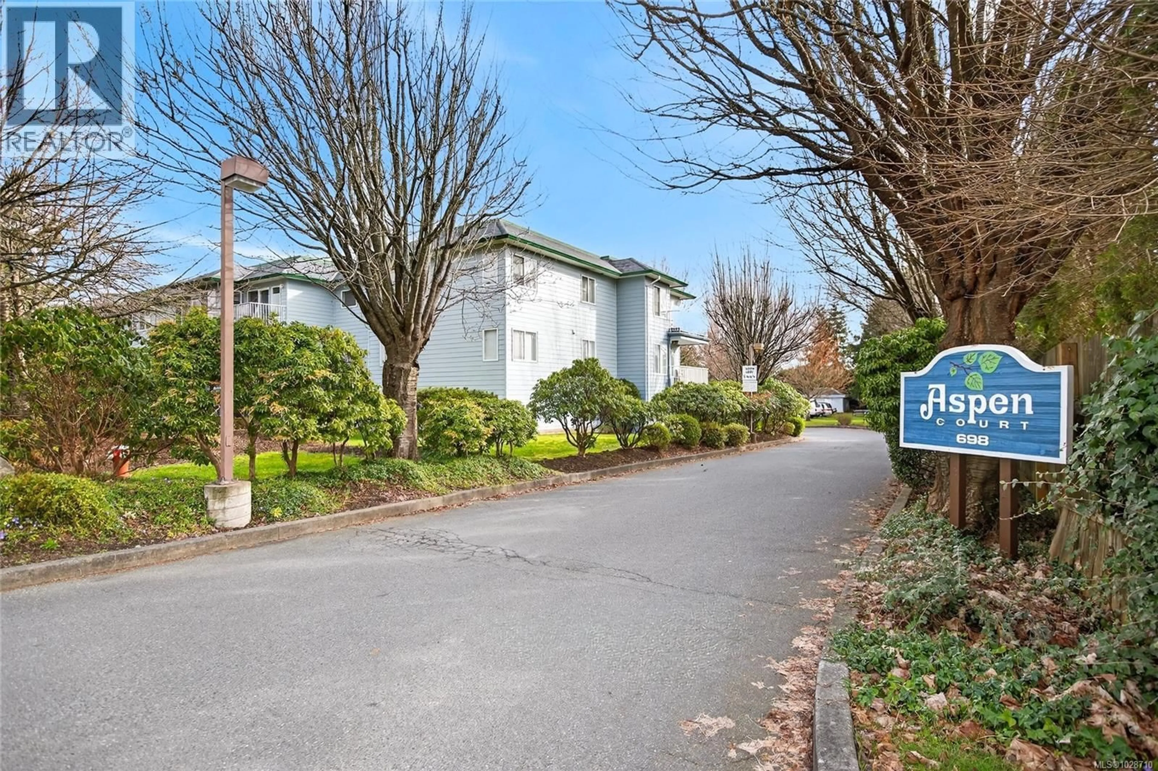 A pic from outside/outdoor area/front of a property/back of a property/a pic from drone, street for 102C - 698 ASPEN ROAD, Comox British Columbia V9M3S9