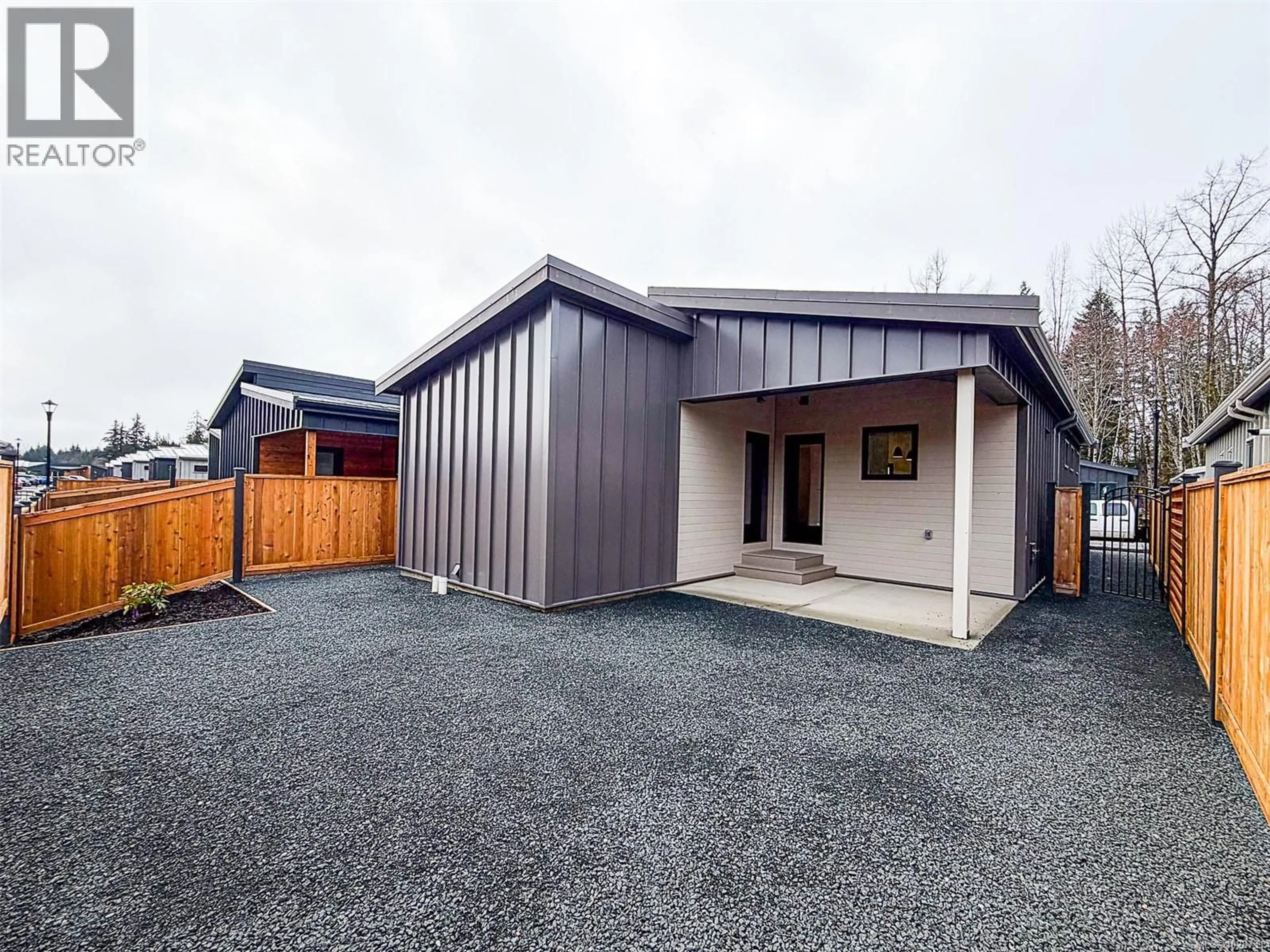 A pic from outside/outdoor area/front of a property/back of a property/a pic from drone, building for 16 - 3025 ROYSTON ROAD, Cumberland British Columbia V0R1S0