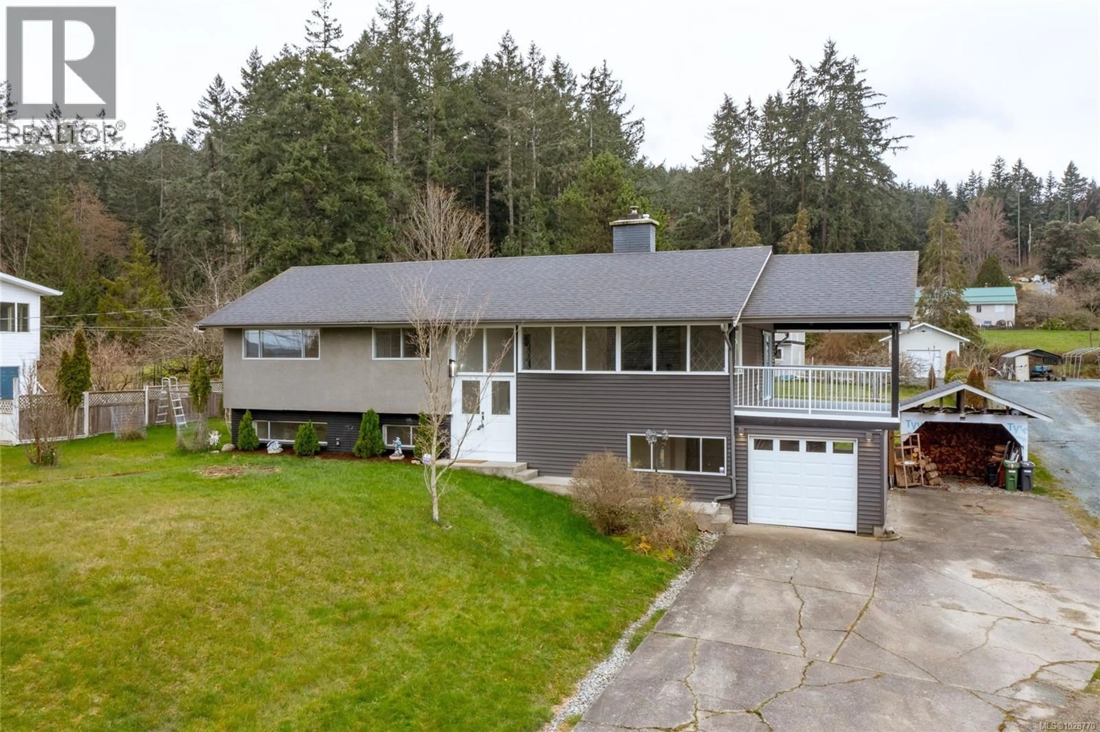 A pic from outside/outdoor area/front of a property/back of a property/a pic from drone, street for 1476 TATLO ROAD, Crofton British Columbia V9L5W7
