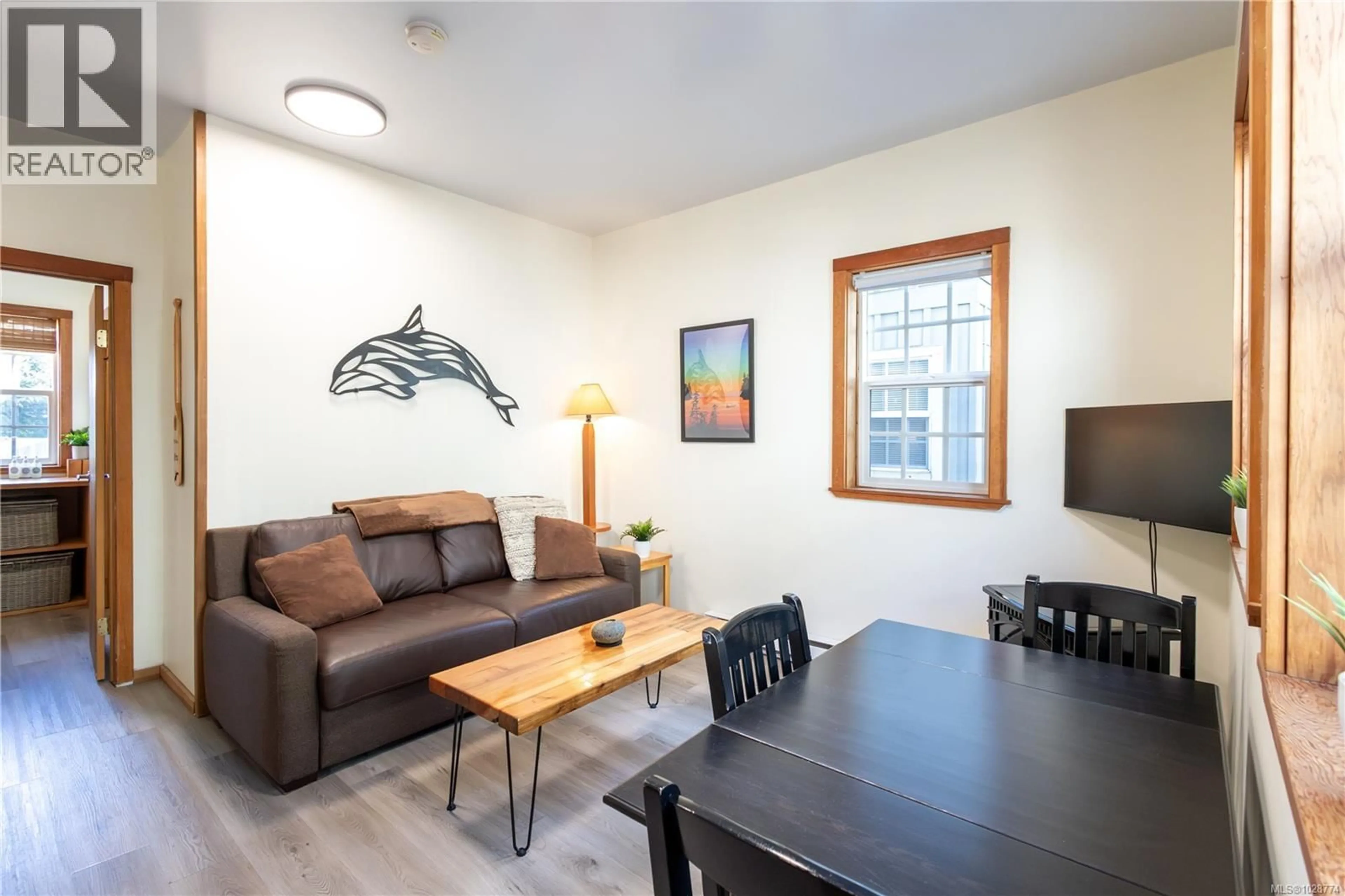 Living room with furniture, wood/laminate floor for 3 - 1002 PENINSULA ROAD, Ucluelet British Columbia V0R3A0