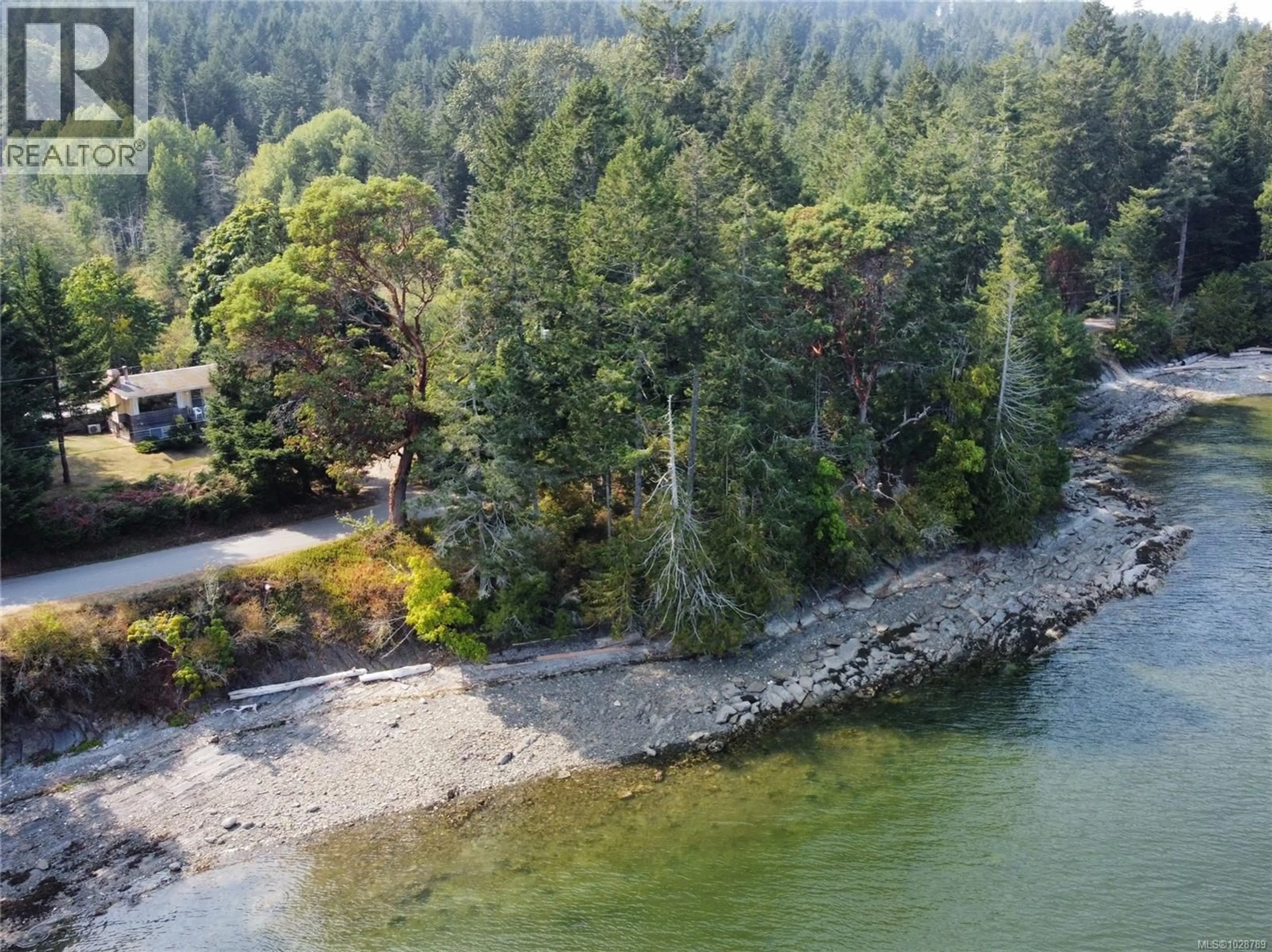 A pic from outside/outdoor area/front of a property/back of a property/a pic from drone, water/lake/river/ocean view for 1520 NORTH BEACH ROAD, Salt Spring British Columbia V8K1A8