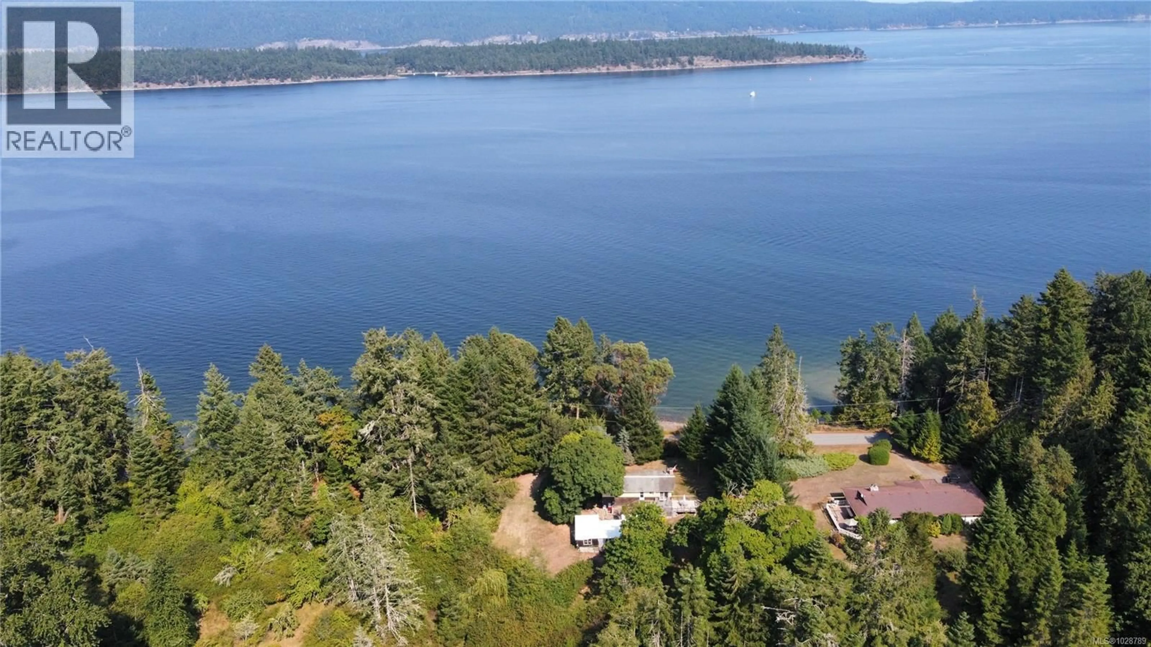 A pic from outside/outdoor area/front of a property/back of a property/a pic from drone, water/lake/river/ocean view for 1520 NORTH BEACH ROAD, Salt Spring British Columbia V8K1A8