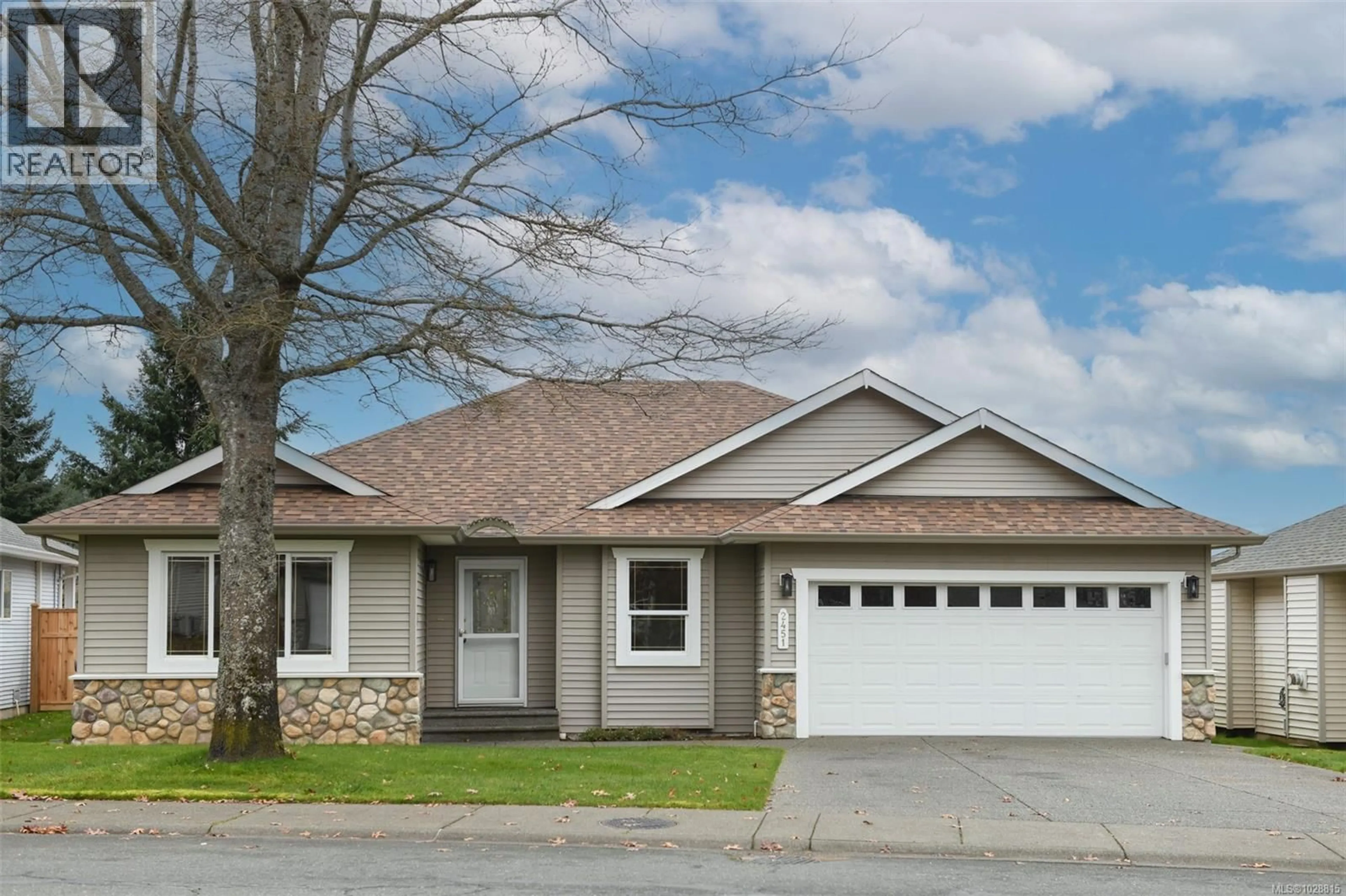 Home with vinyl exterior material, street for 2451 IDIENS WAY, Courtenay British Columbia V9N9J4