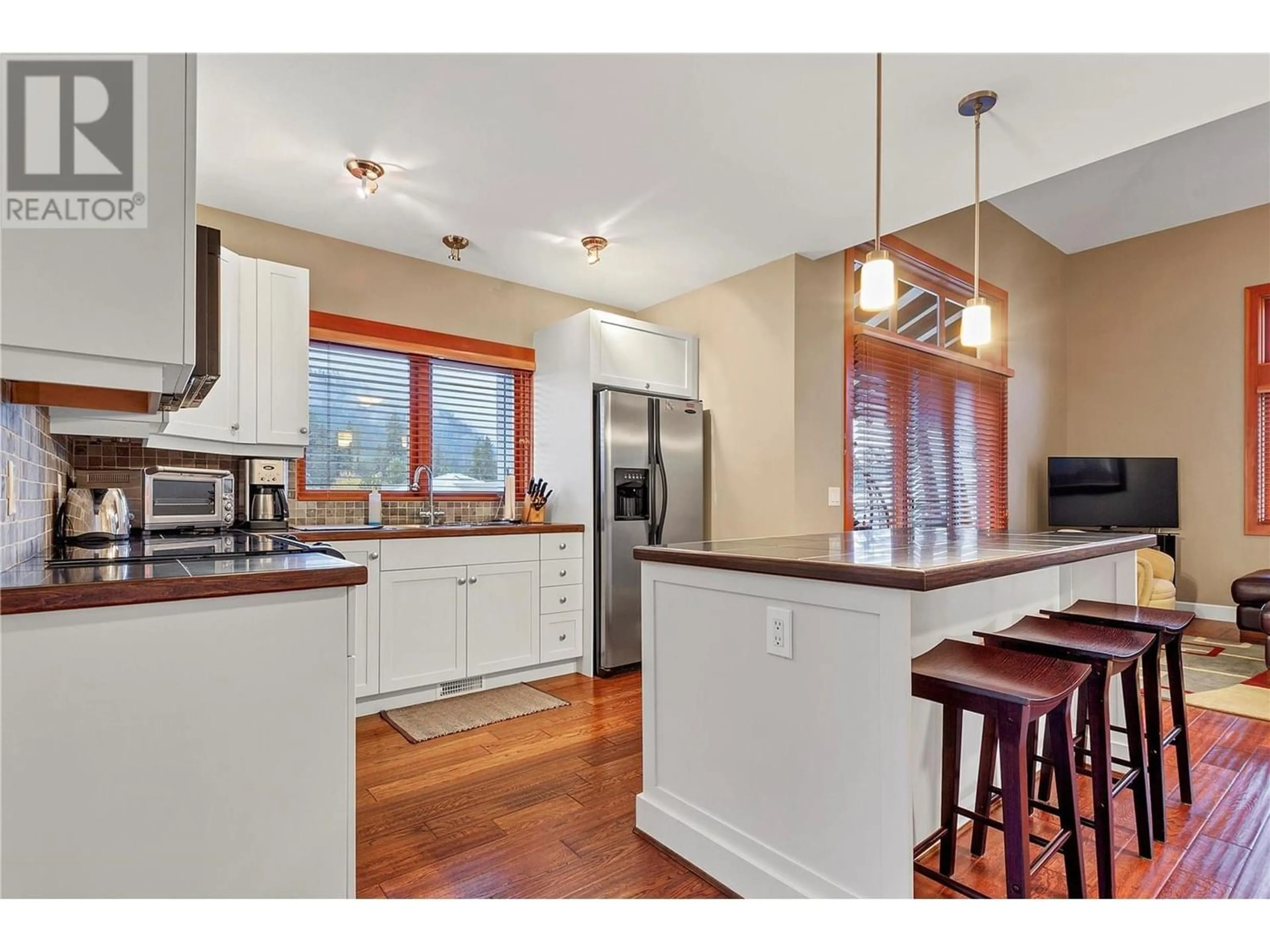 Open concept kitchen for 9845 Eastside Road Unit# 96, Vernon British Columbia V1H1Z2