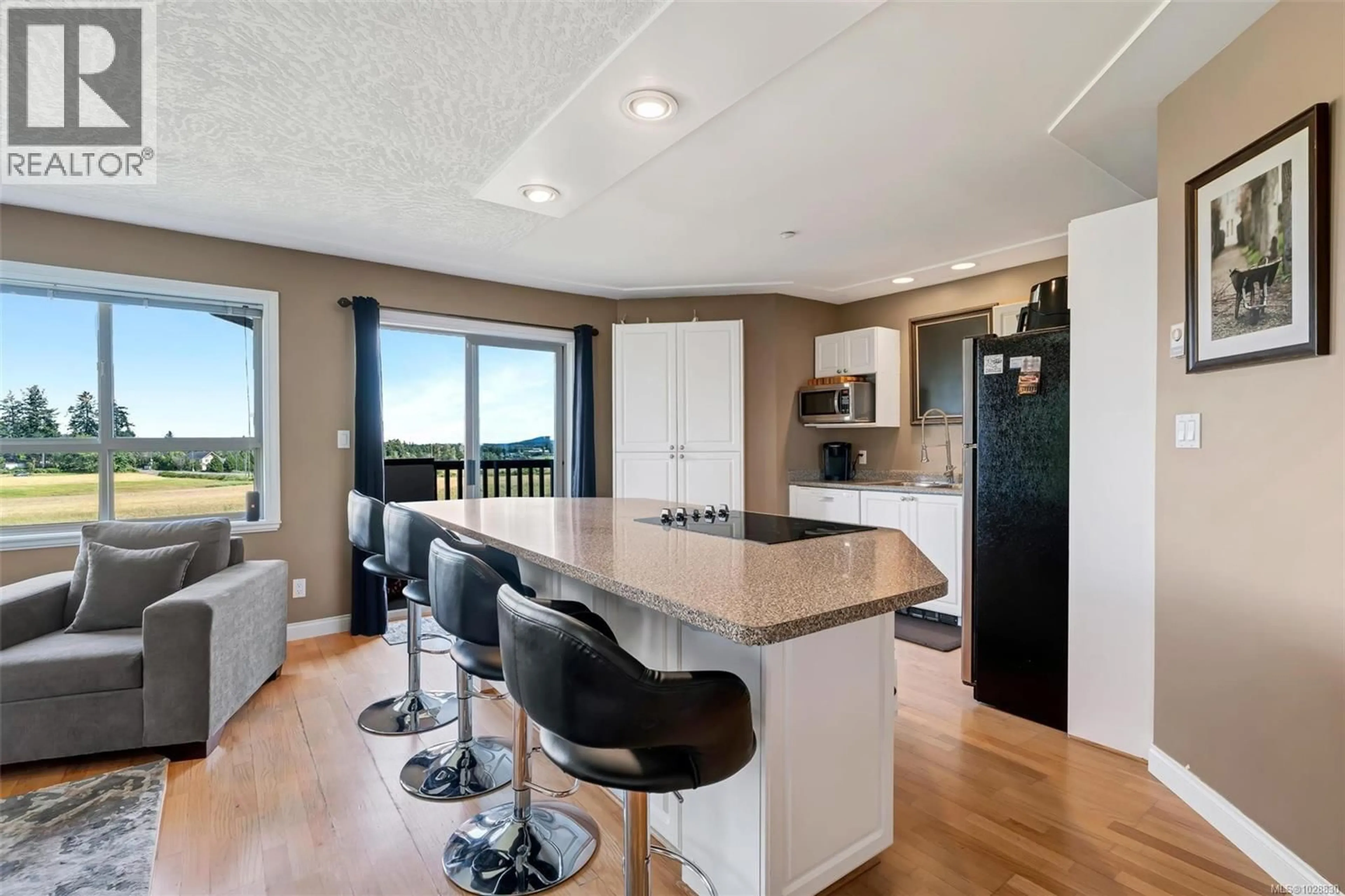 Open concept kitchen, unknown for 10 - 7847 EAST SAANICH ROAD, Central Saanich British Columbia V8M2B4