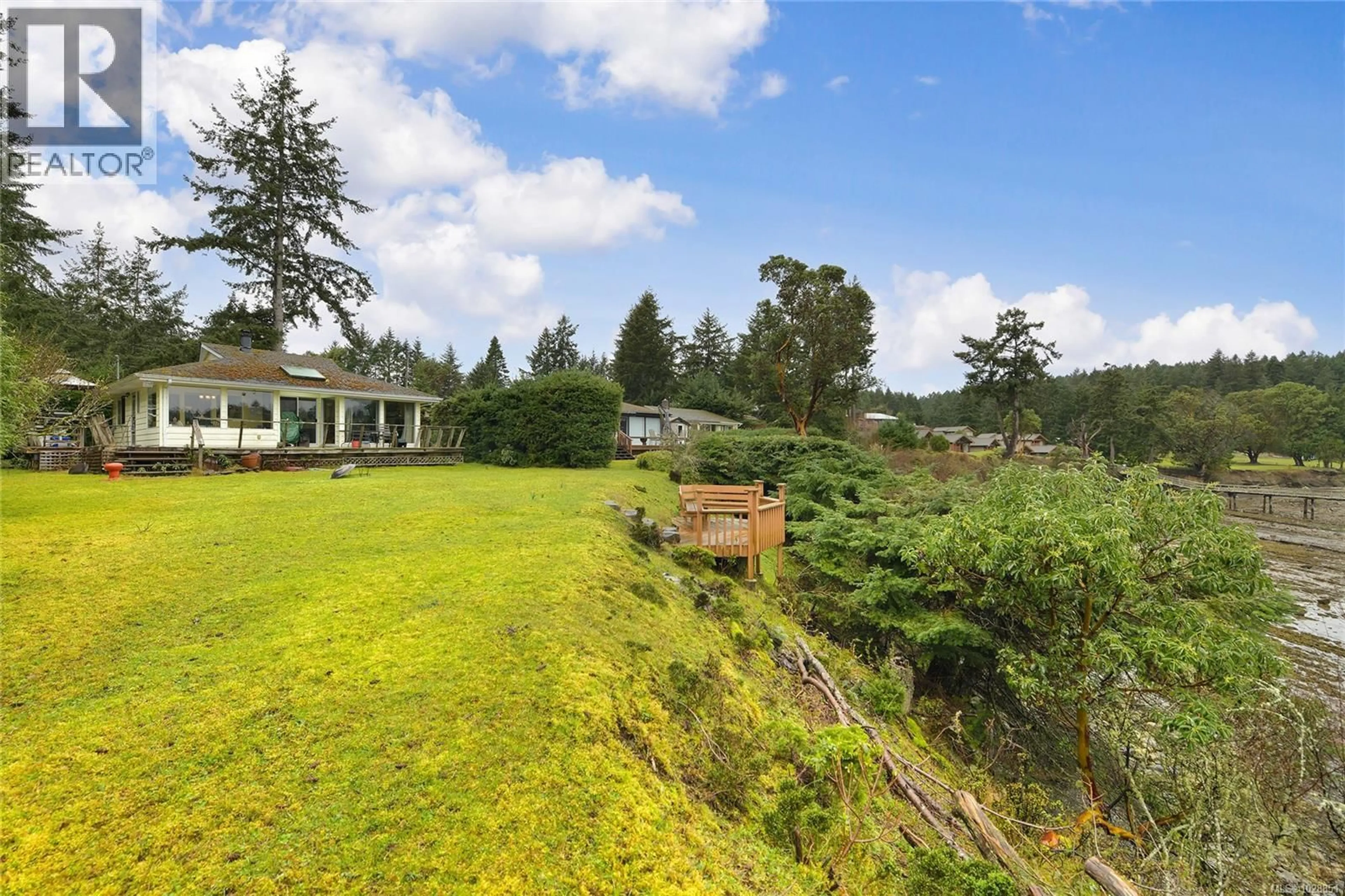 A pic from outside/outdoor area/front of a property/back of a property/a pic from drone, water/lake/river/ocean view for 506 ARBUTUS DRIVE, Mayne Island British Columbia V0N2J1