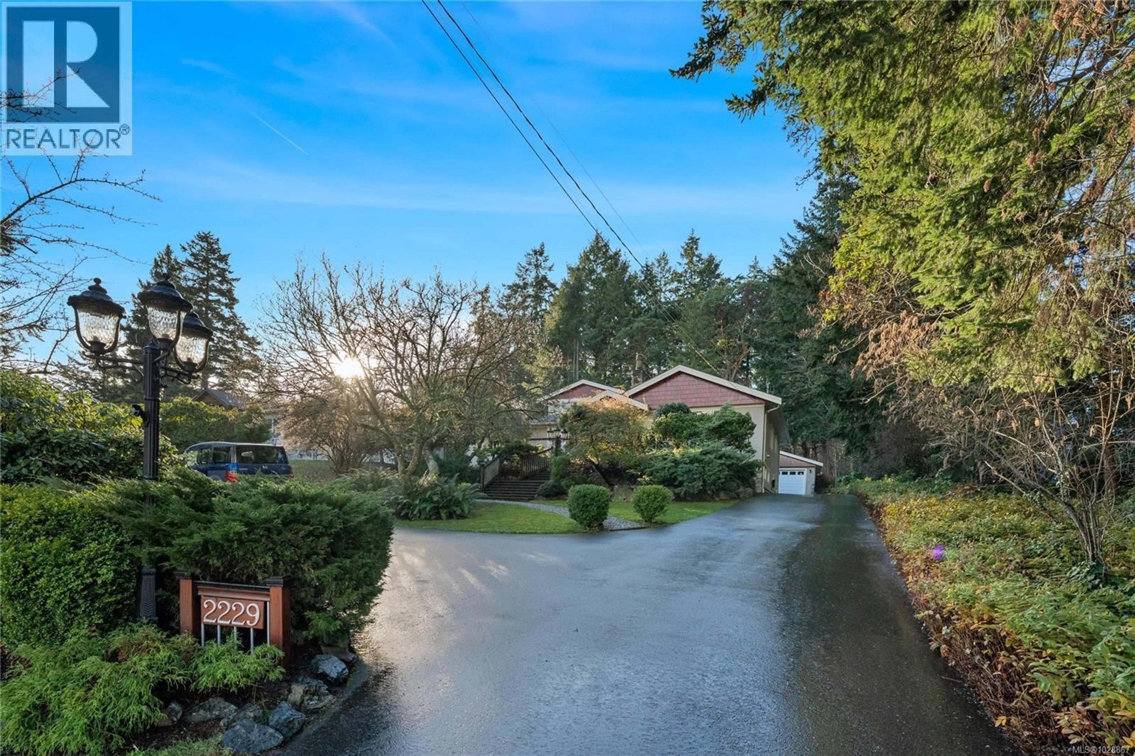A pic from outside/outdoor area/front of a property/back of a property/a pic from drone, street for 2229 ARBUTUS ROAD, Saanich British Columbia V8N1V2