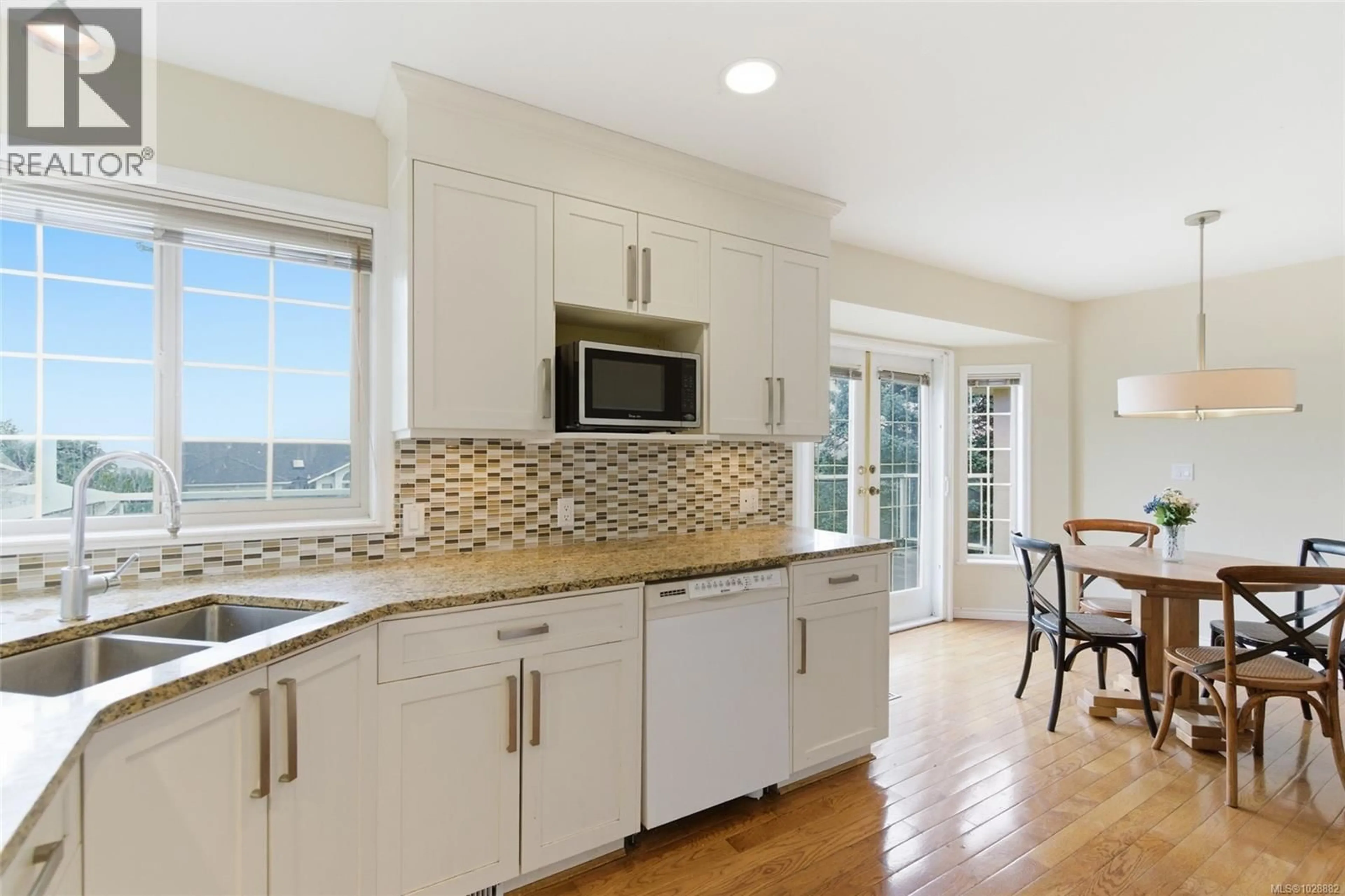 Open concept kitchen, ceramic/tile floor for 6439 NIDRI PLACE, Nanaimo British Columbia V9V1N6