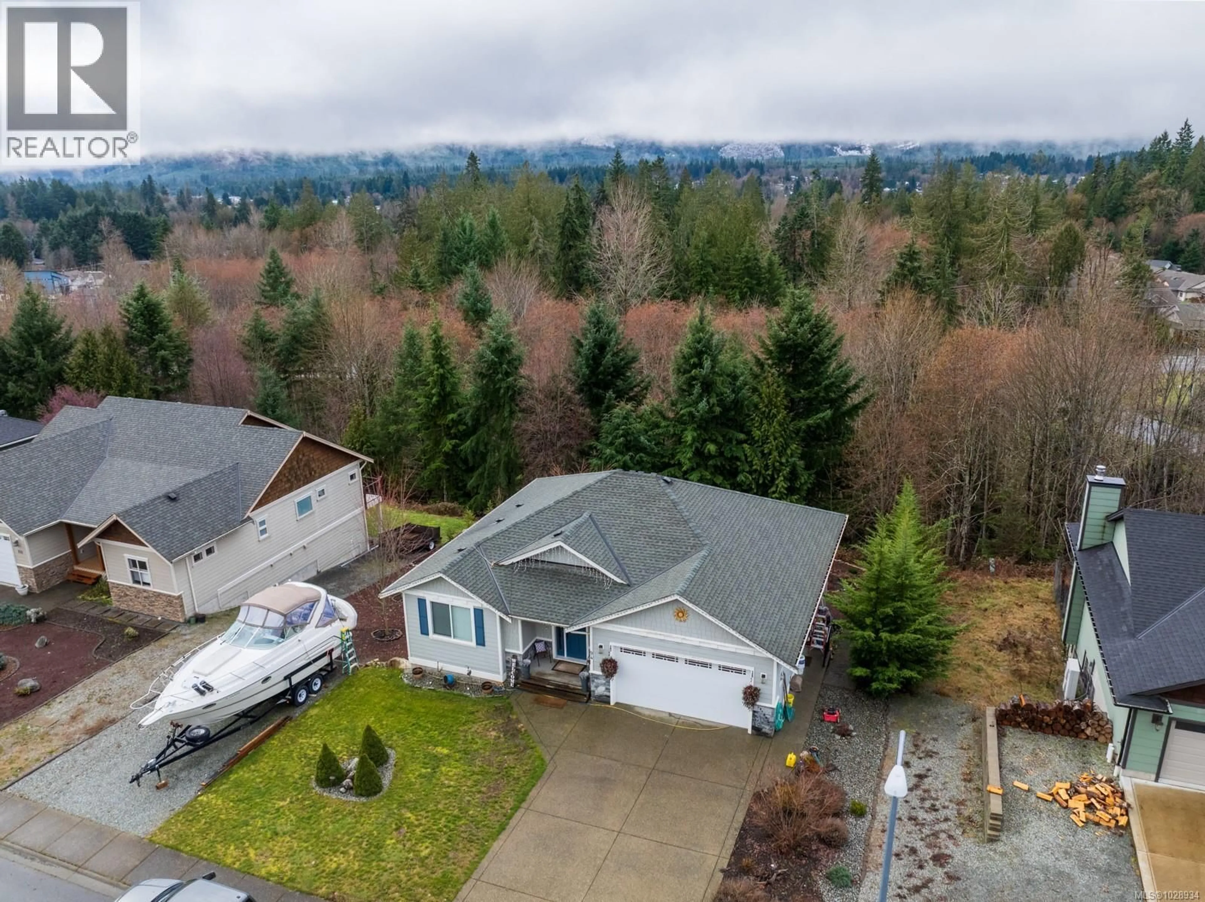 A pic from outside/outdoor area/front of a property/back of a property/a pic from drone, water/lake/river/ocean view for 94 BEECH CRESCENT, Lake Cowichan British Columbia V0R2G1