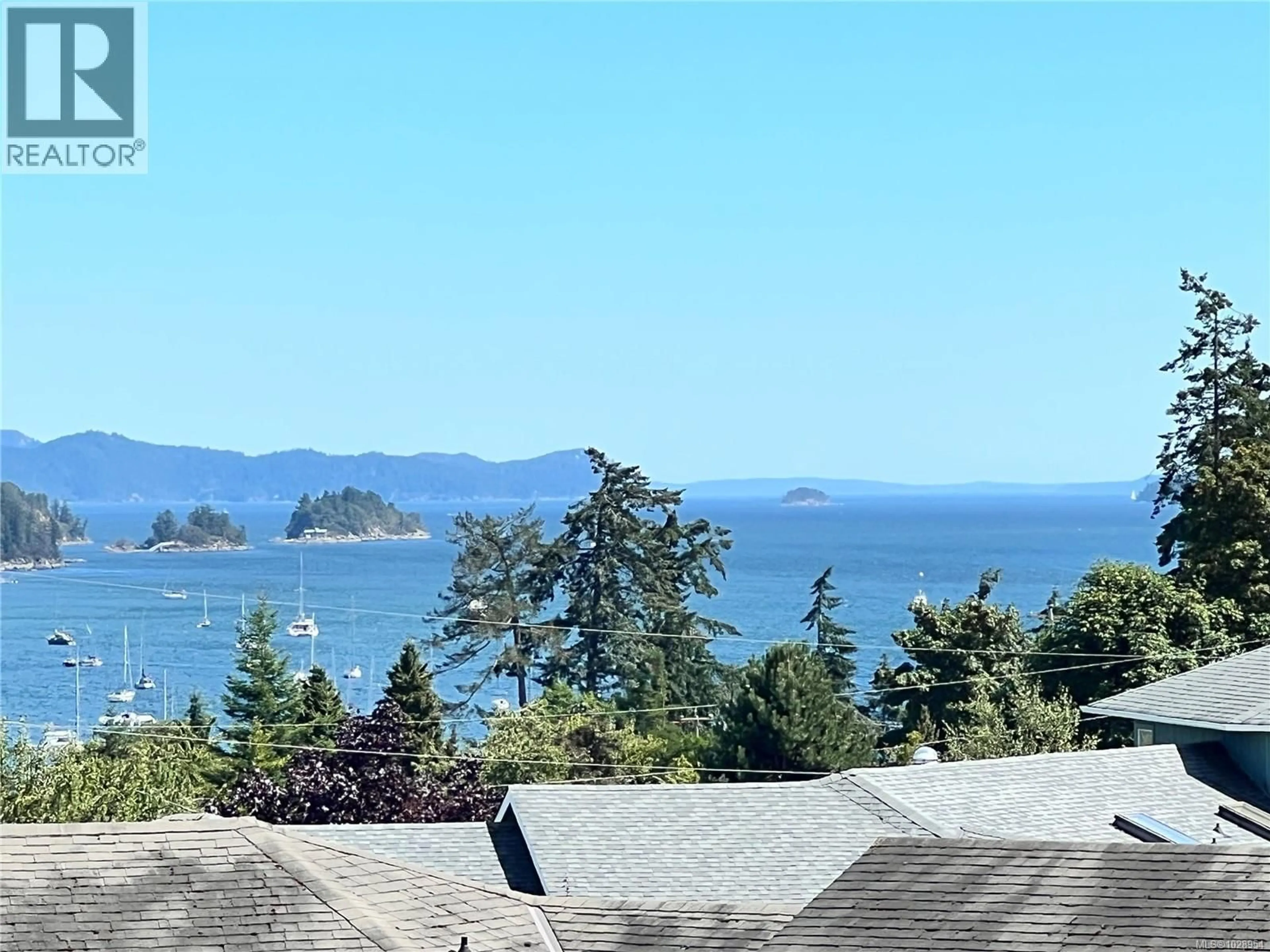 A pic from outside/outdoor area/front of a property/back of a property/a pic from drone, water/lake/river/ocean view for 3 - 130 CORBETT ROAD, Salt Spring British Columbia V8K1T2