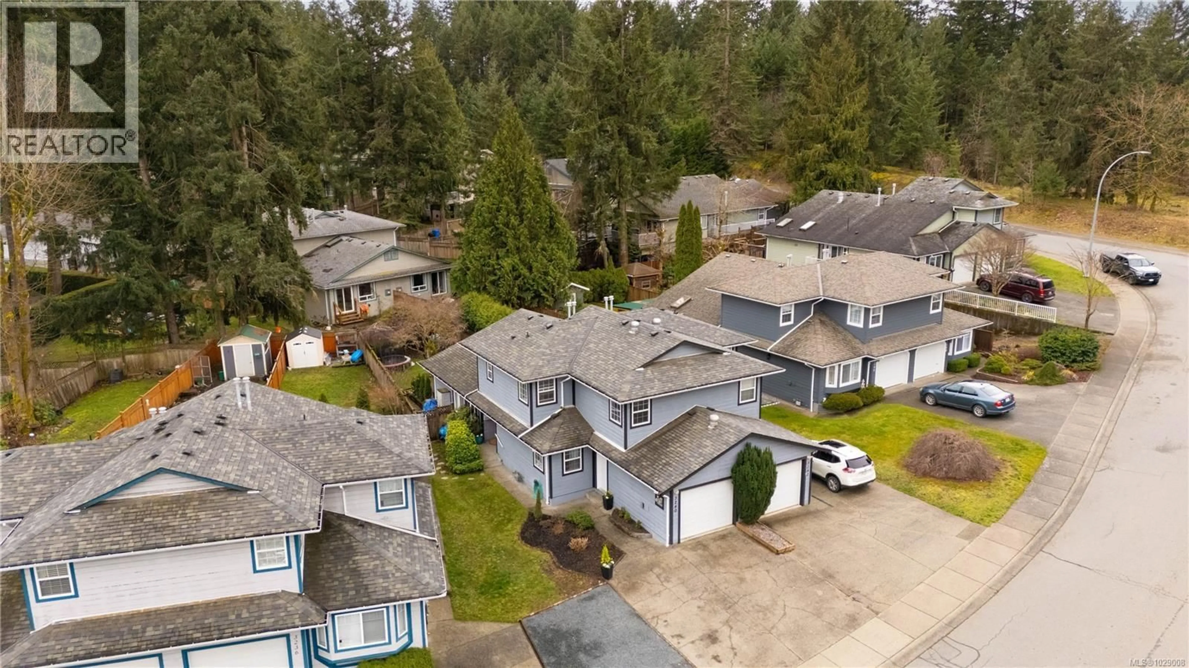 A pic from outside/outdoor area/front of a property/back of a property/a pic from drone, street for 3240 HILLWOOD ROAD, Duncan British Columbia V9L5K6