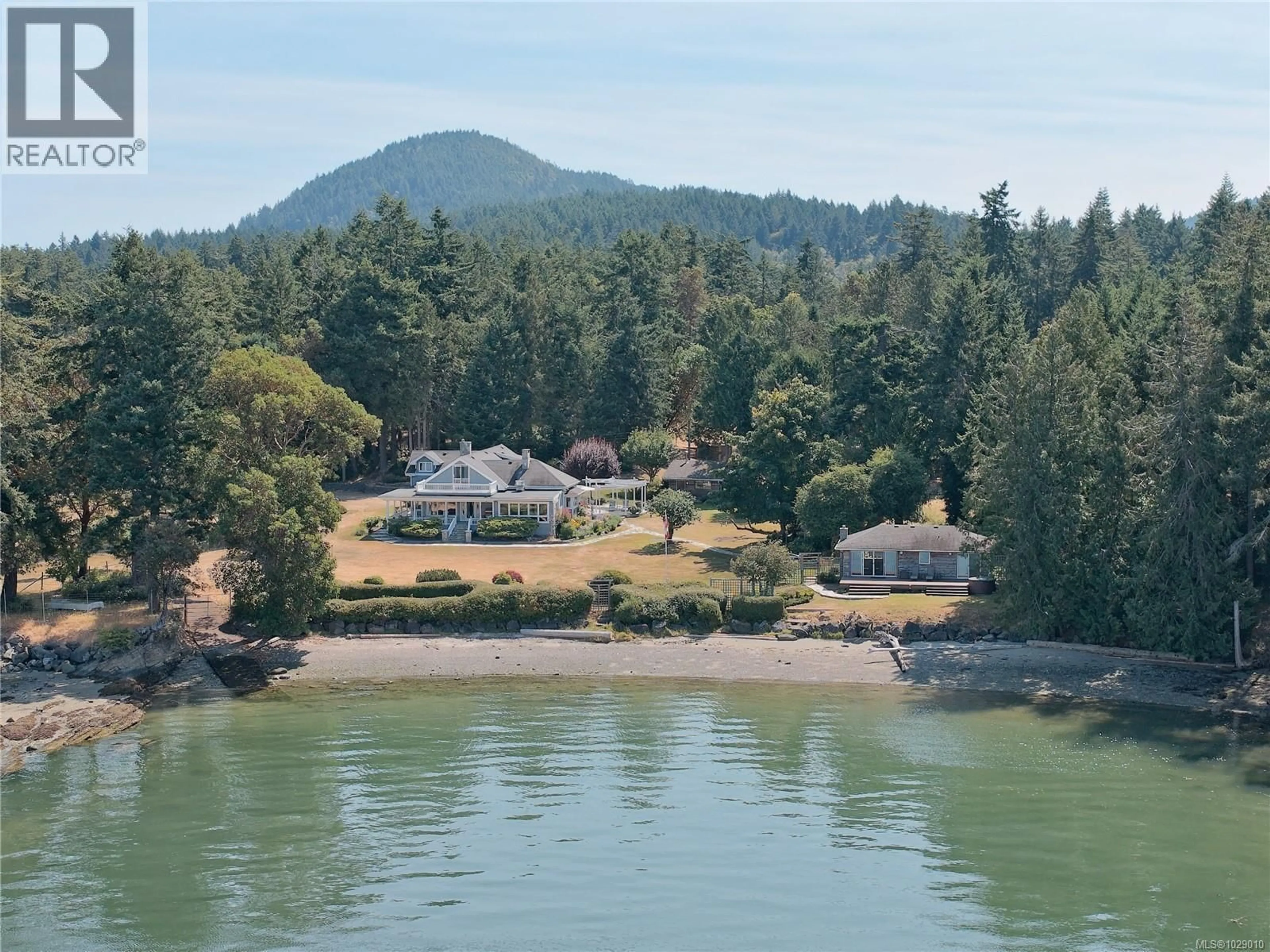 A pic from outside/outdoor area/front of a property/back of a property/a pic from drone, water/lake/river/ocean view for 101 CHURCH BAY ROAD, Saturna Island British Columbia V0N2Y0