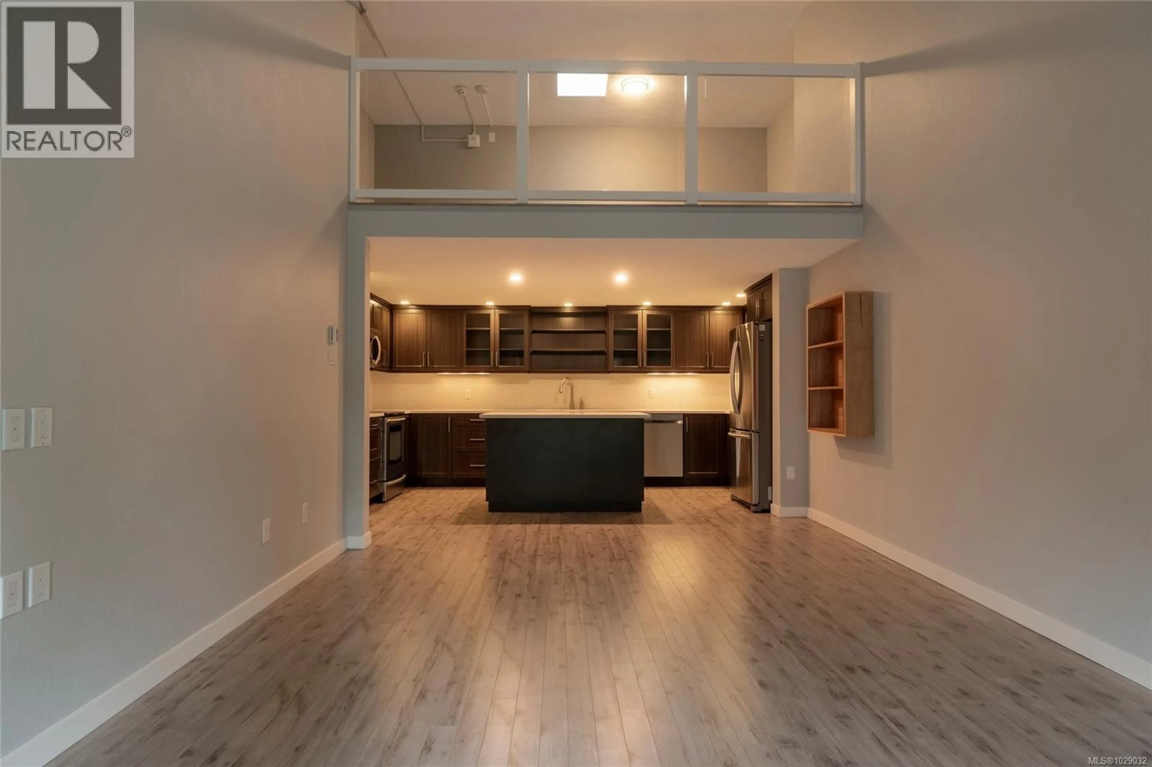 Open concept kitchen, wood/laminate floor for 408 - 1005 MCKENZIE AVENUE, Saanich British Columbia V8X4A9