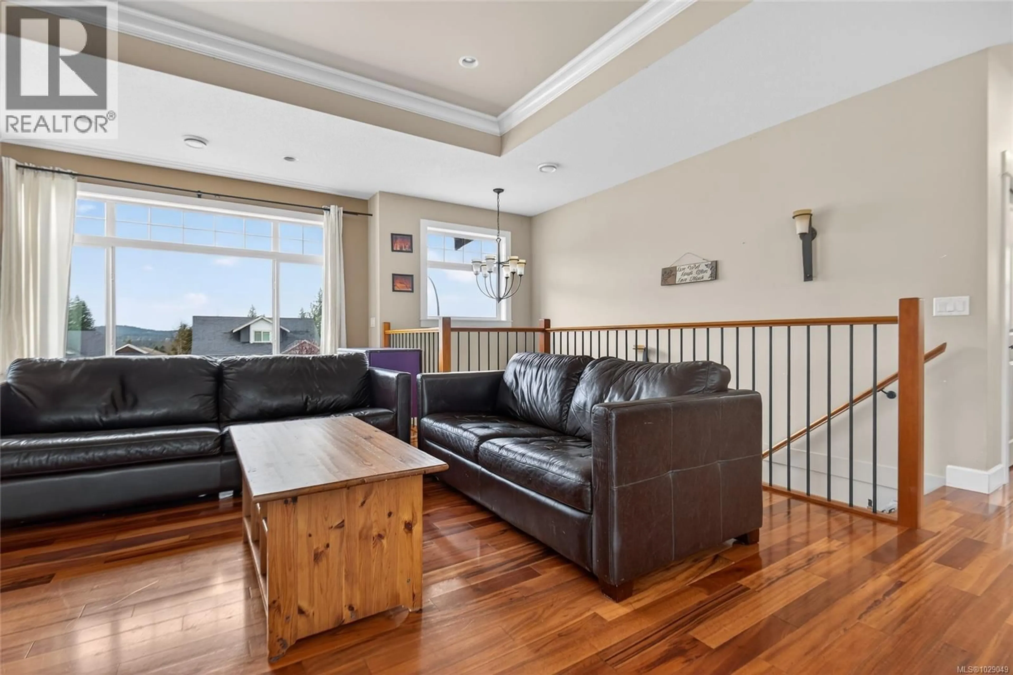 Living room with furniture, wood/laminate floor for 2323 ROCKWOOD PLACE, Nanaimo British Columbia V9R7B3