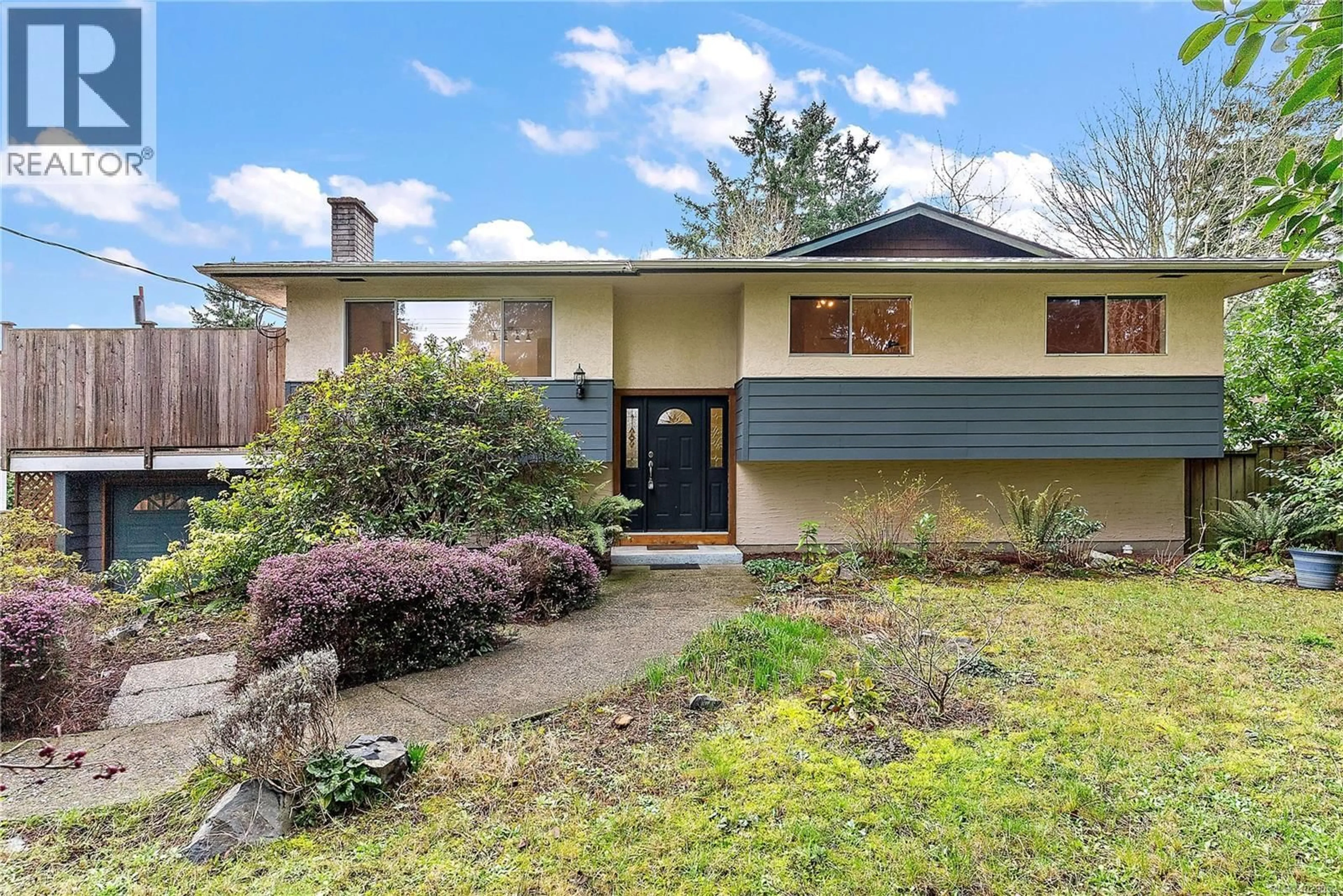 Home with vinyl exterior material, street for 2009 STELLY'S CROSS ROAD, Central Saanich British Columbia V8M1M8