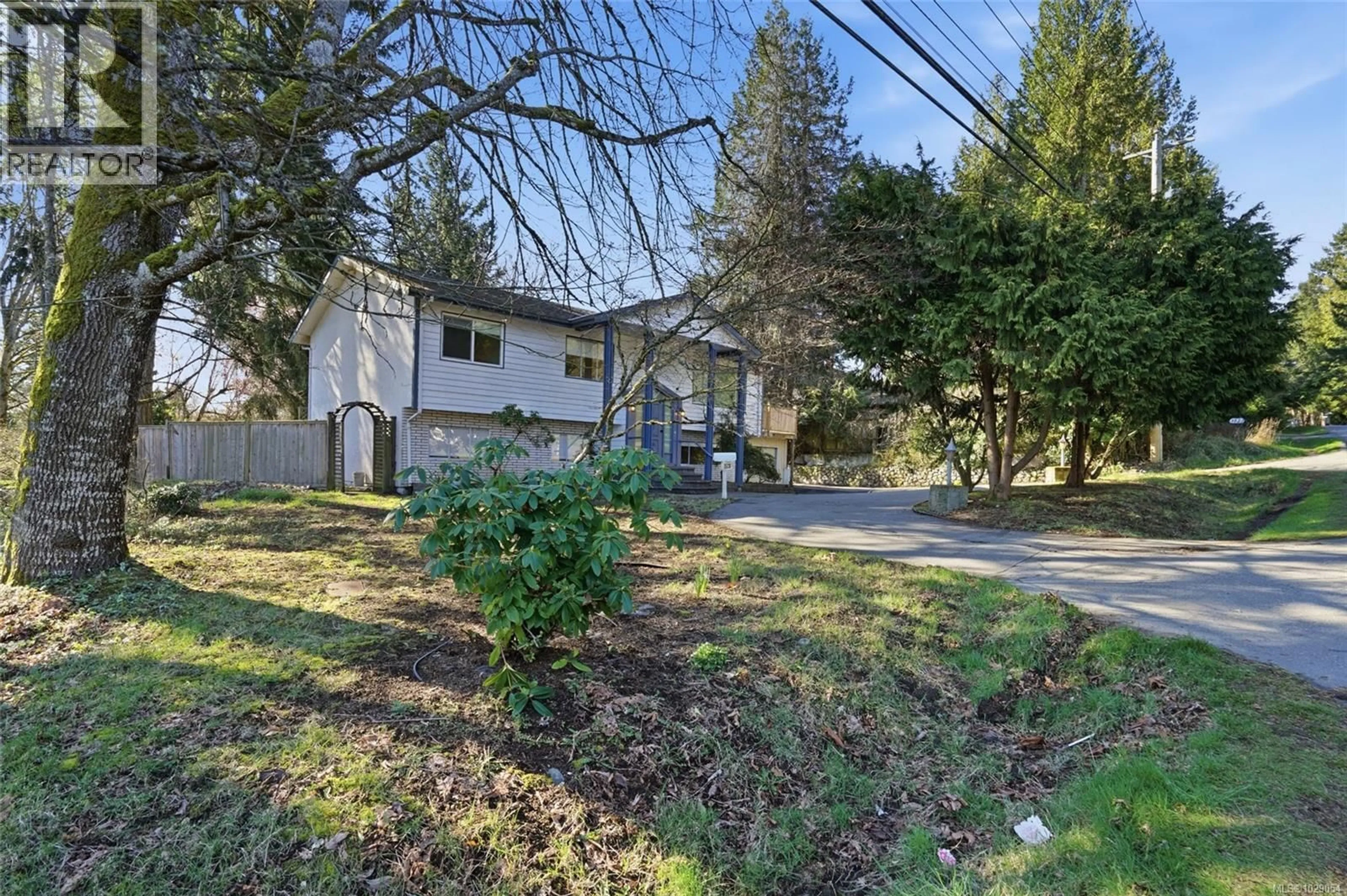 A pic from outside/outdoor area/front of a property/back of a property/a pic from drone, street for 3528 HAMMOND BAY ROAD, Nanaimo British Columbia V9T3E5