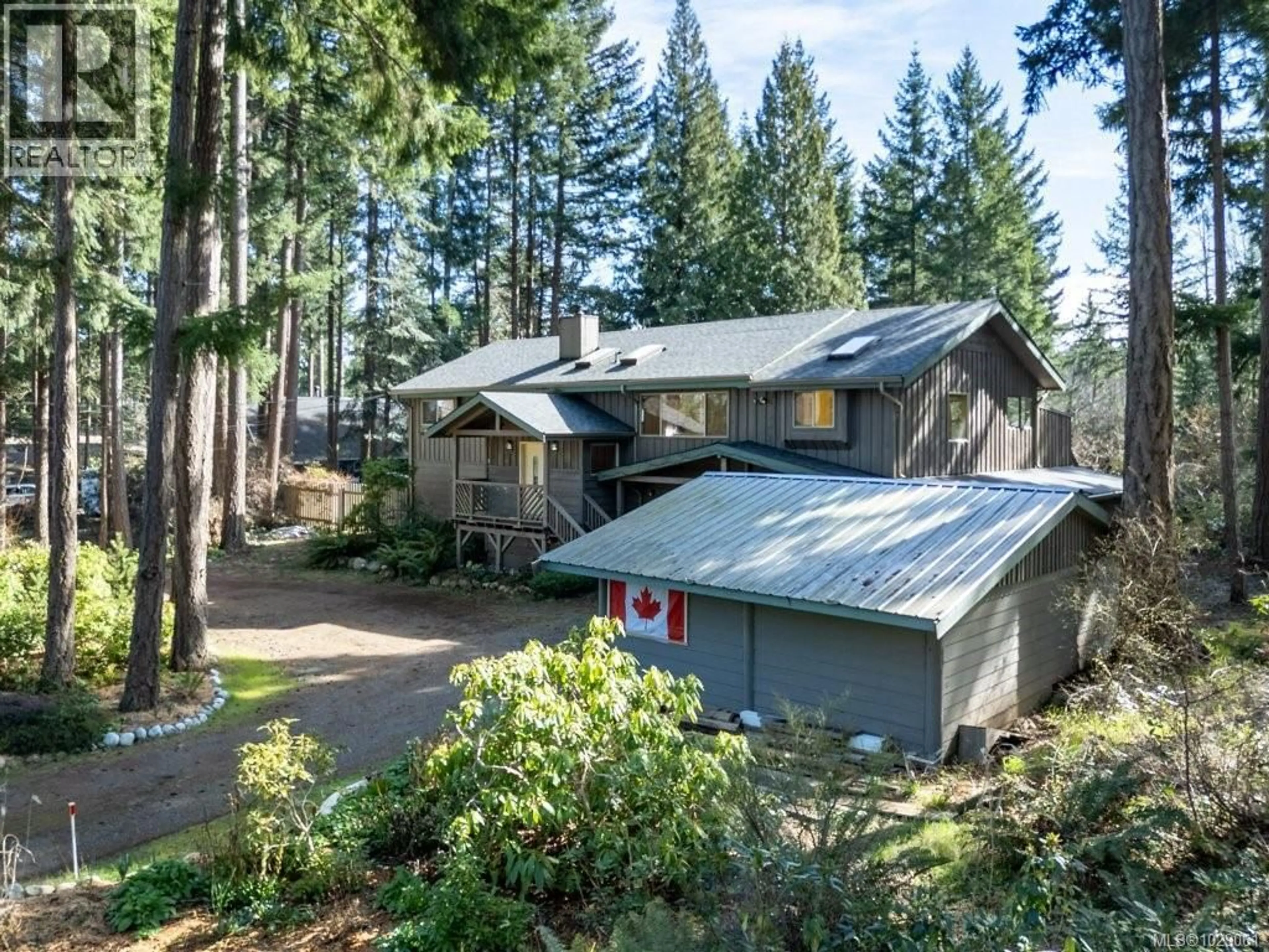 A pic from outside/outdoor area/front of a property/back of a property/a pic from drone, forest/trees view for 1931 THURBER ROAD, Comox British Columbia V9M3Z5
