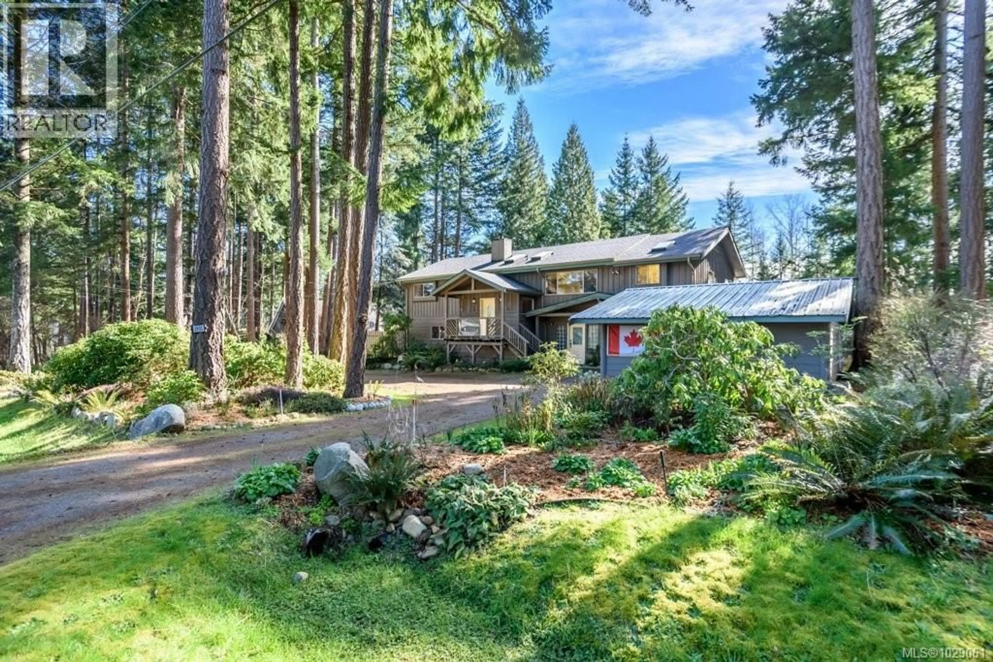A pic from outside/outdoor area/front of a property/back of a property/a pic from drone, forest/trees view for 1931 THURBER ROAD, Comox British Columbia V9M3Z5